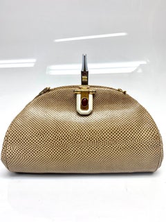 Judith Leiber Tan Karung Snake Handbag with Stone Buckle Front.