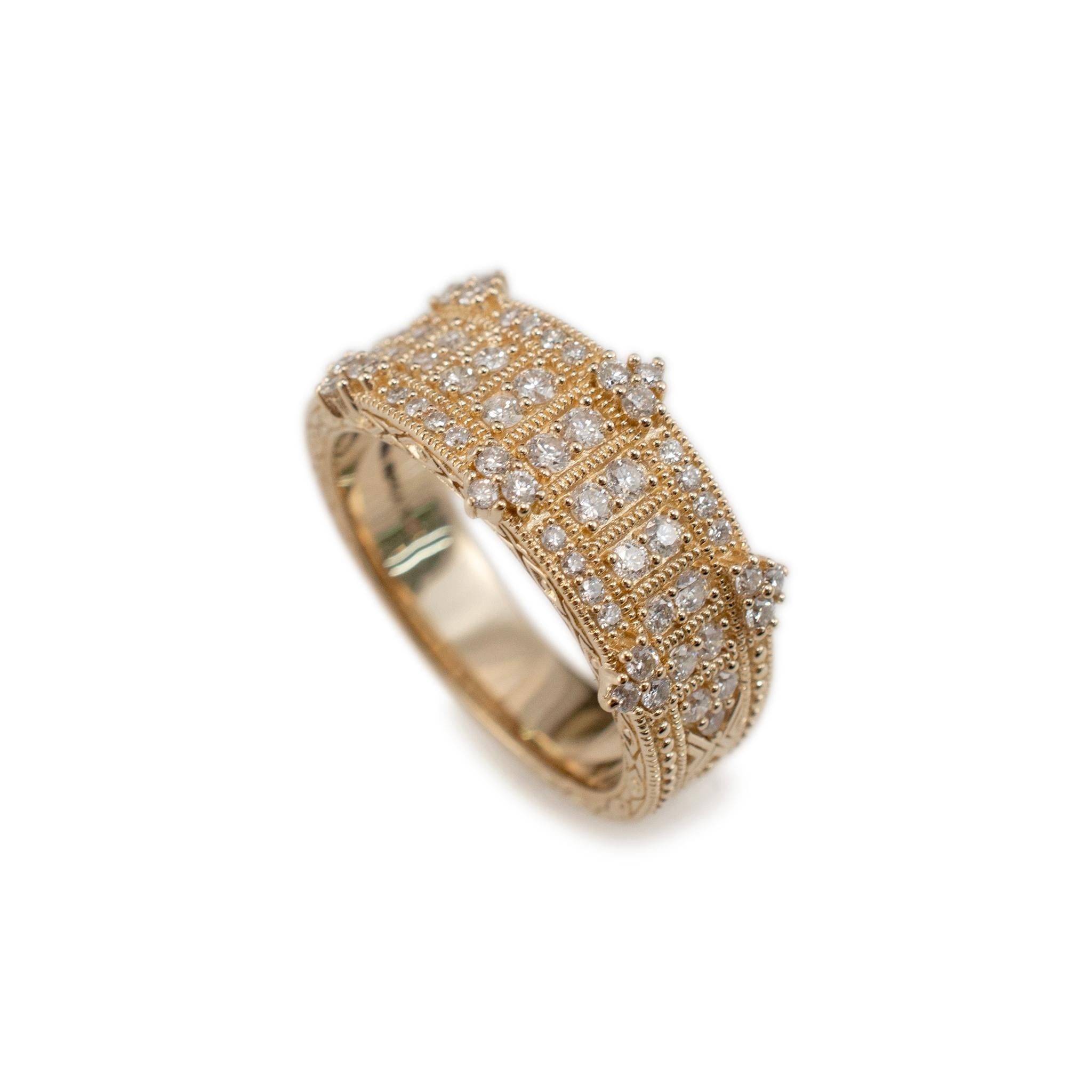Brand: Judith Ripka

Gender: Ladies 

Metal Type: 14K Yellow Gold

Ring Size: 7

Width: 10.10 mm tapering to 4.65 mm 

Weight: 7.47 grams

Ladies 14K yellow gold diamond band with a half-round shank. The metal was tested and determined to be 14K
