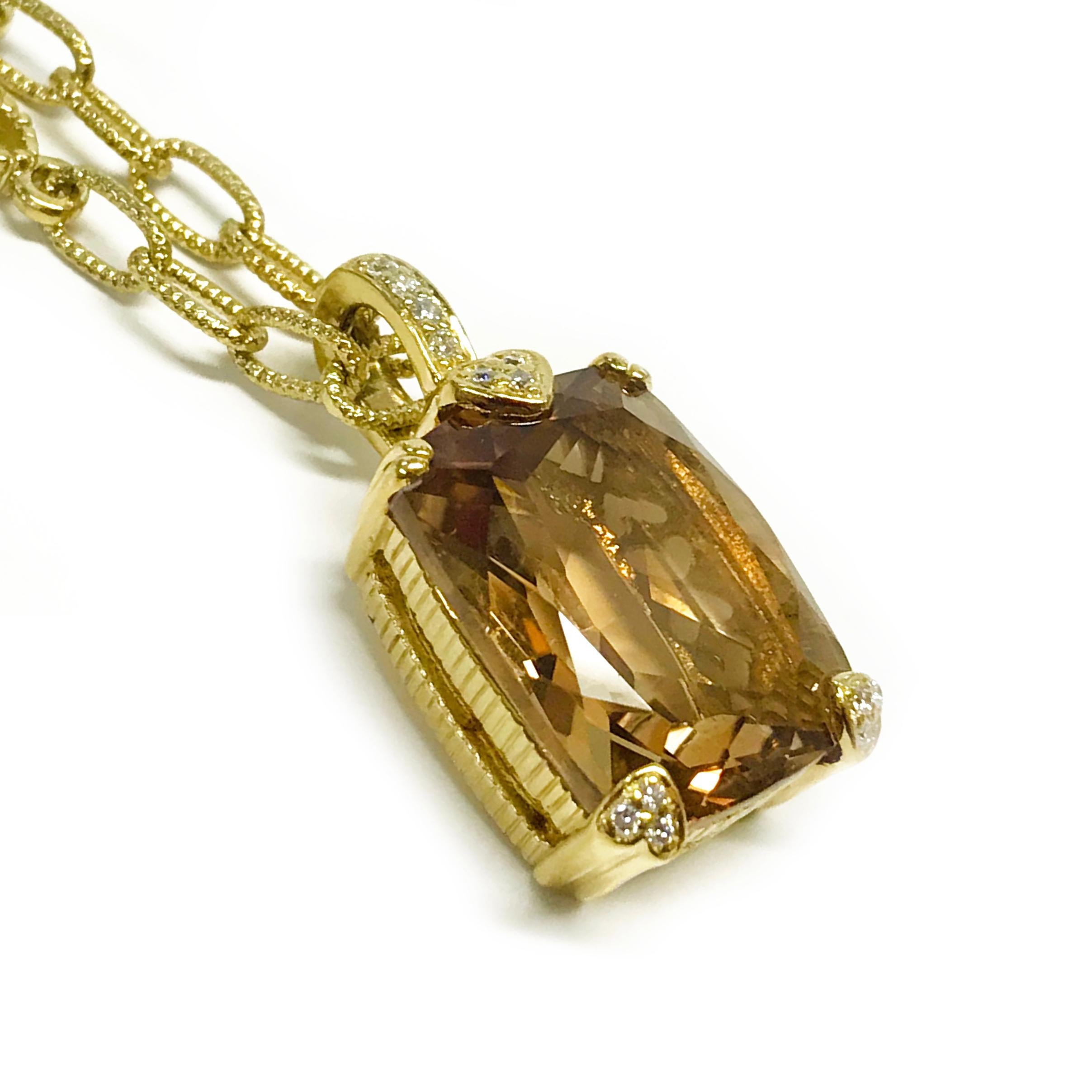 Judith Ripka 18 Karat Diamond Citrine Necklace Pendant. The pendant features a large cushion-cut Citrine with thirteen diamonds on the heart-shaped prongs and enhancer bail. The pendant measures 13.3mm high (not including the bail) x 7.9mm wide x