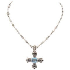 Judith Ripka 18 Karat Gold Aquamarine with White and Black Diamond Cross Pendant
