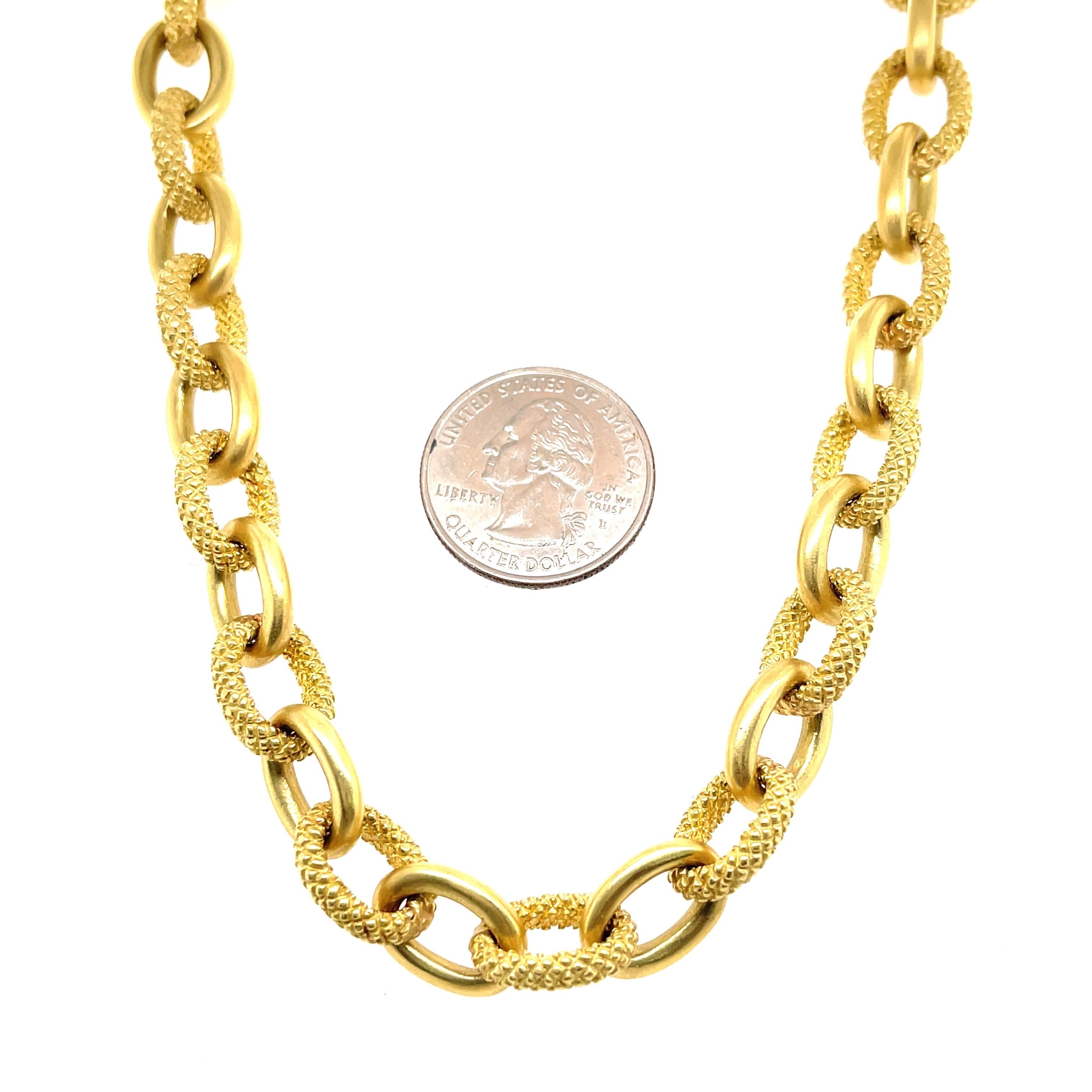 Judith Ripka 18 karat yellow gold necklace featuring polished and beaded links weighing 135.9 grams.