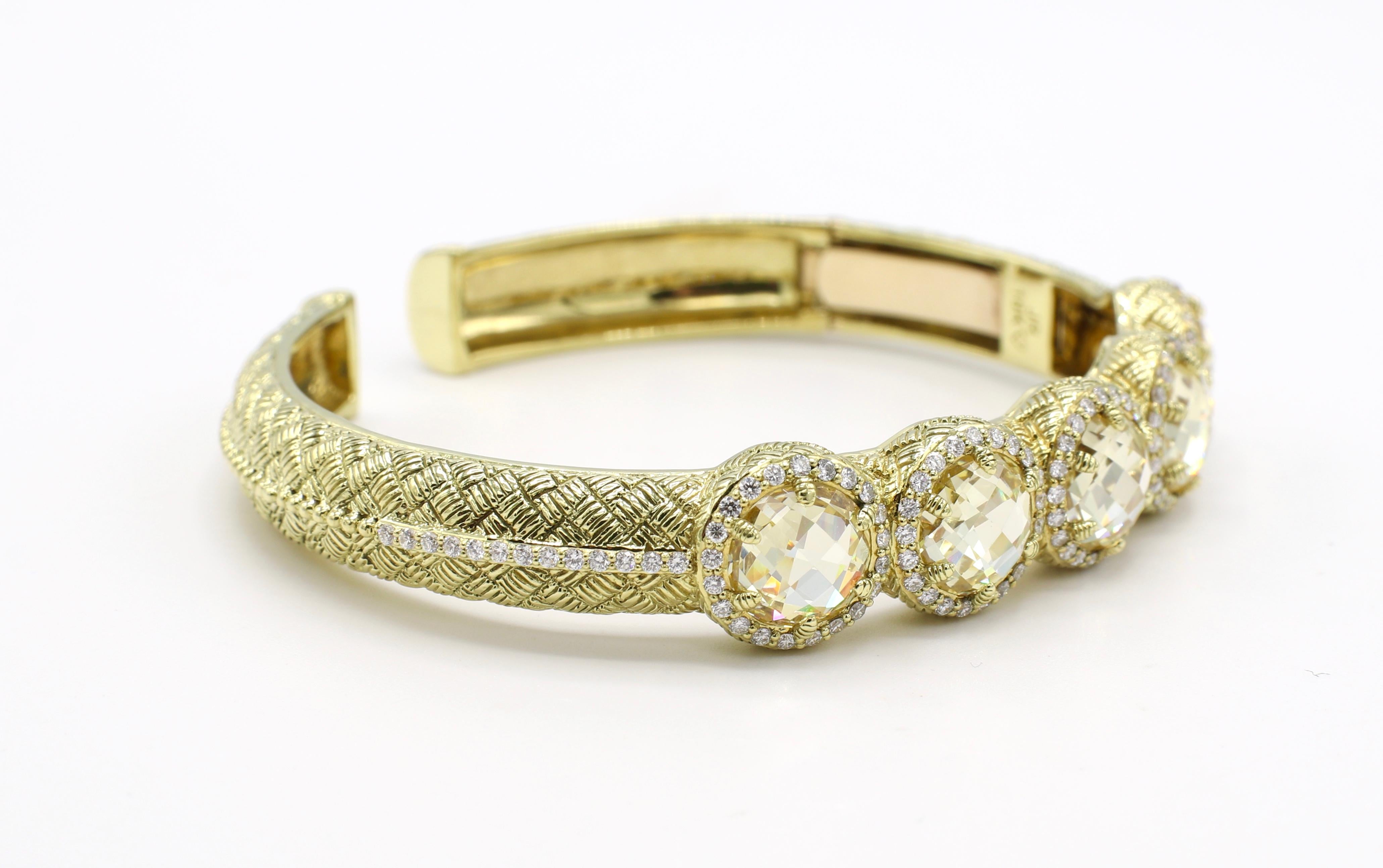 Judith Ripka 18K Diamond & Citrine Bangle Bracelet 

Metal: 18k yellow gold
Weight: 32 grams
Diamonds: Approx. .65 CTW round brilliant cut diamonds, G VS
Diameter: 2.36 inches 
Width: 11mm at top, 8.3 at bottom 
Signed: JR 18K

