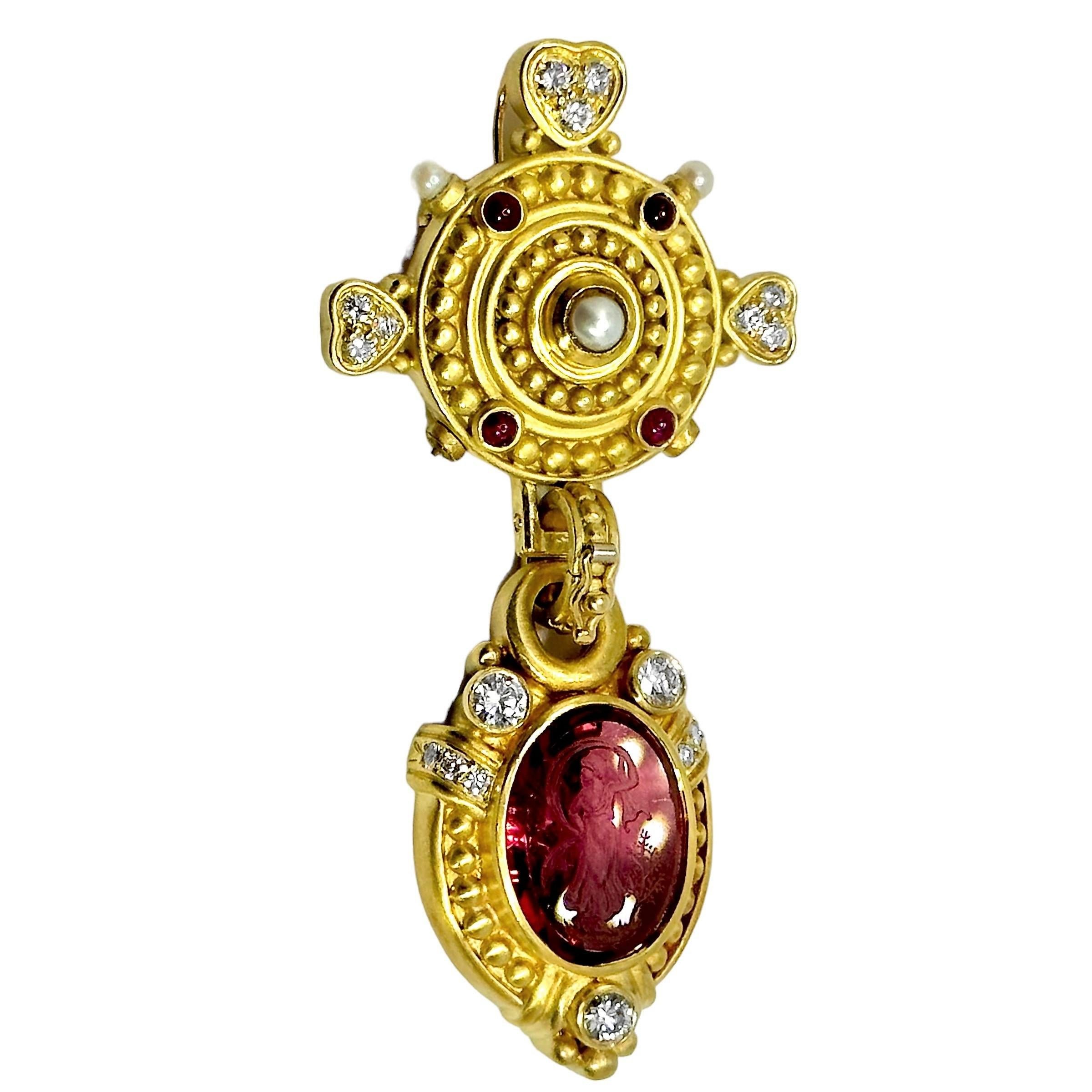 This Judith Ripka Classic Revival style creation is truly elegant. Every surface is executed in satin finish. The many jewels are quite vivid in contrast. On the bottom part is one bezel set, fine, 10ct Rubelite Tourmaline Intaglio surrounded by