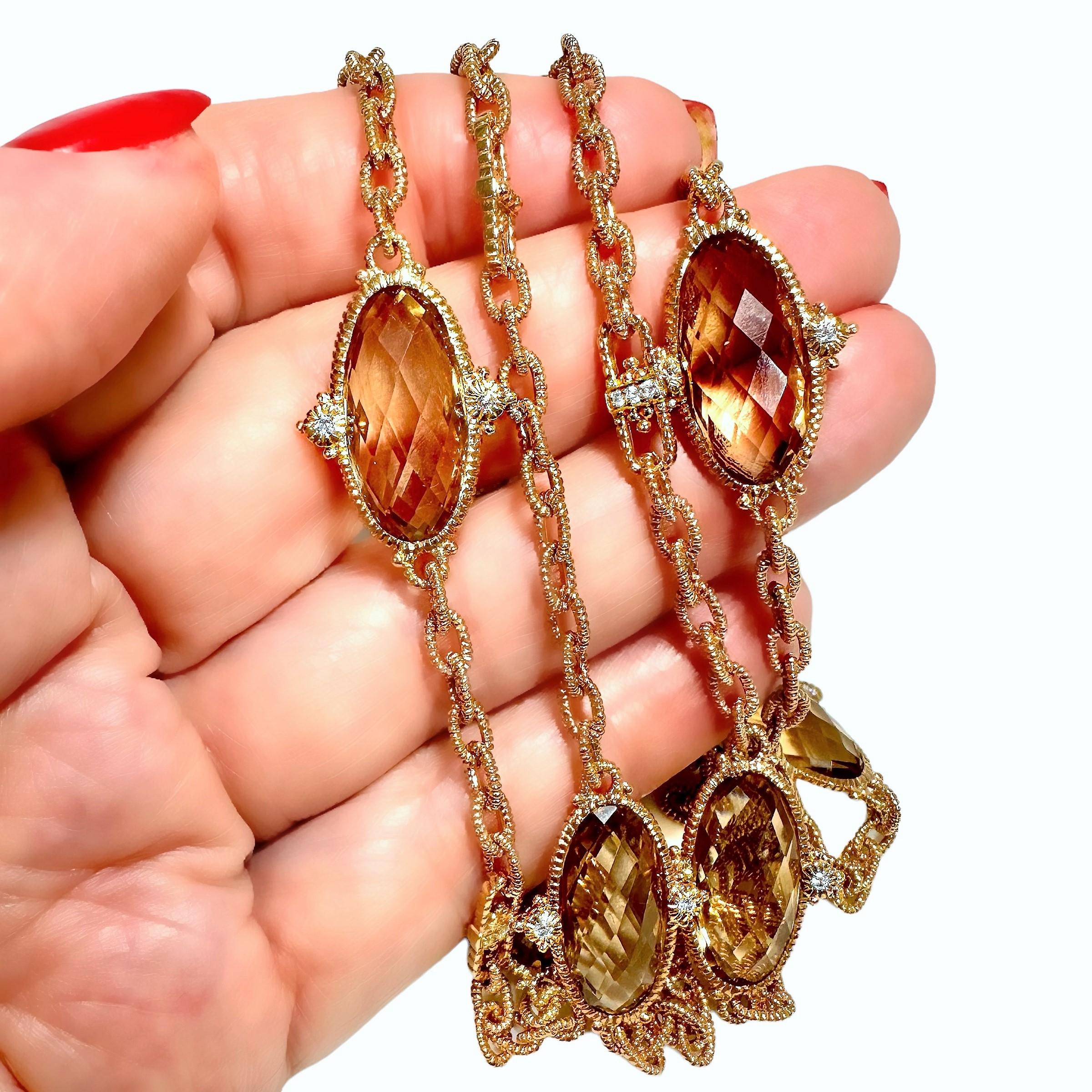 This unique Judith Ripka creation is crafted in a very bold hue of 18K rose gold, with each and every surface highly detailed and finished. Eight bezel set oval faceted smoky quartz stones punctuate the length of the necklace and brilliant cut