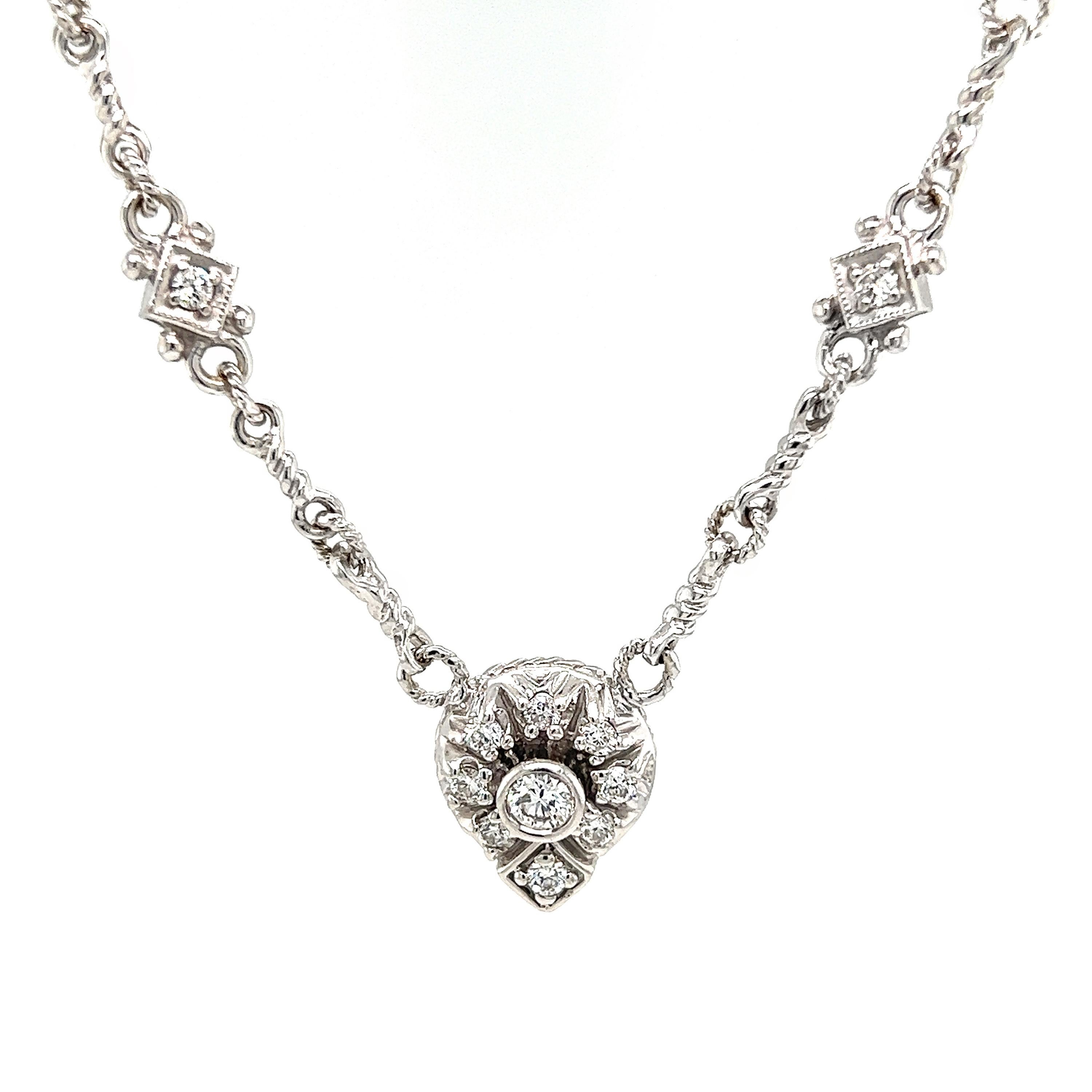 Judith Ripka 18K White Gold and Diamond Handmade Chain Pendant Necklace

Apprx. 0.70 carat G-H color, VS-SI clarity diamonds total weight

Necklace is 16 inches in length total and uses a handmade chain.

Pendant measures 0.54 inch x 0.47.

Signed