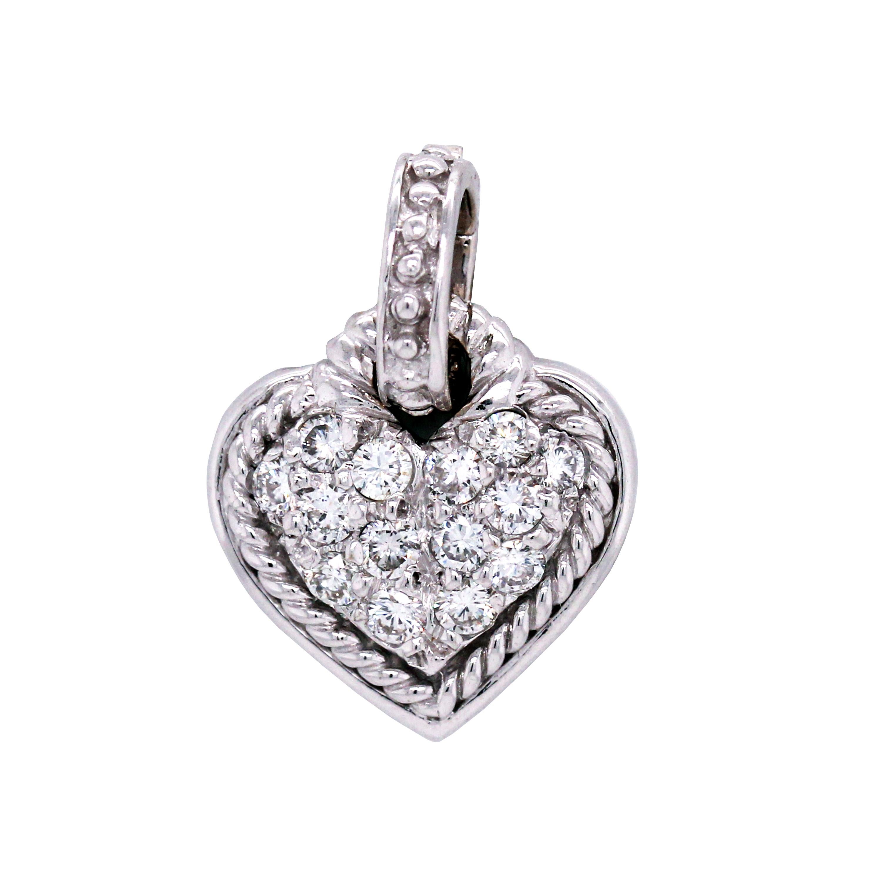 Judith Ripka 18K White Gold and Diamond Heart Pendant with Handmade Chain

This cute heart charm pendant has diamonds and is hung on a 18K white gold handmade chain with diamonds. There are two bezels with diamonds

1 carat apprx. G color, VS