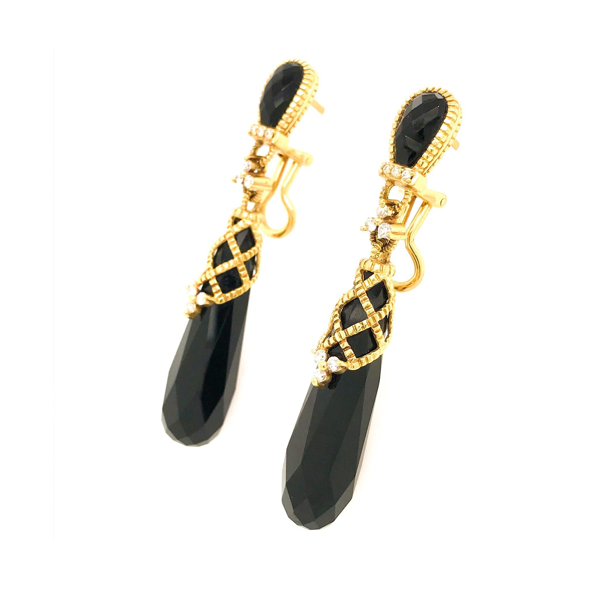 METAL TYPE: 18k Yellow Gold
STONE WEIGHT: 0.20ct twd
TOTAL WEIGHT: 19.8 grams
LENGTH: 2.5 inches
