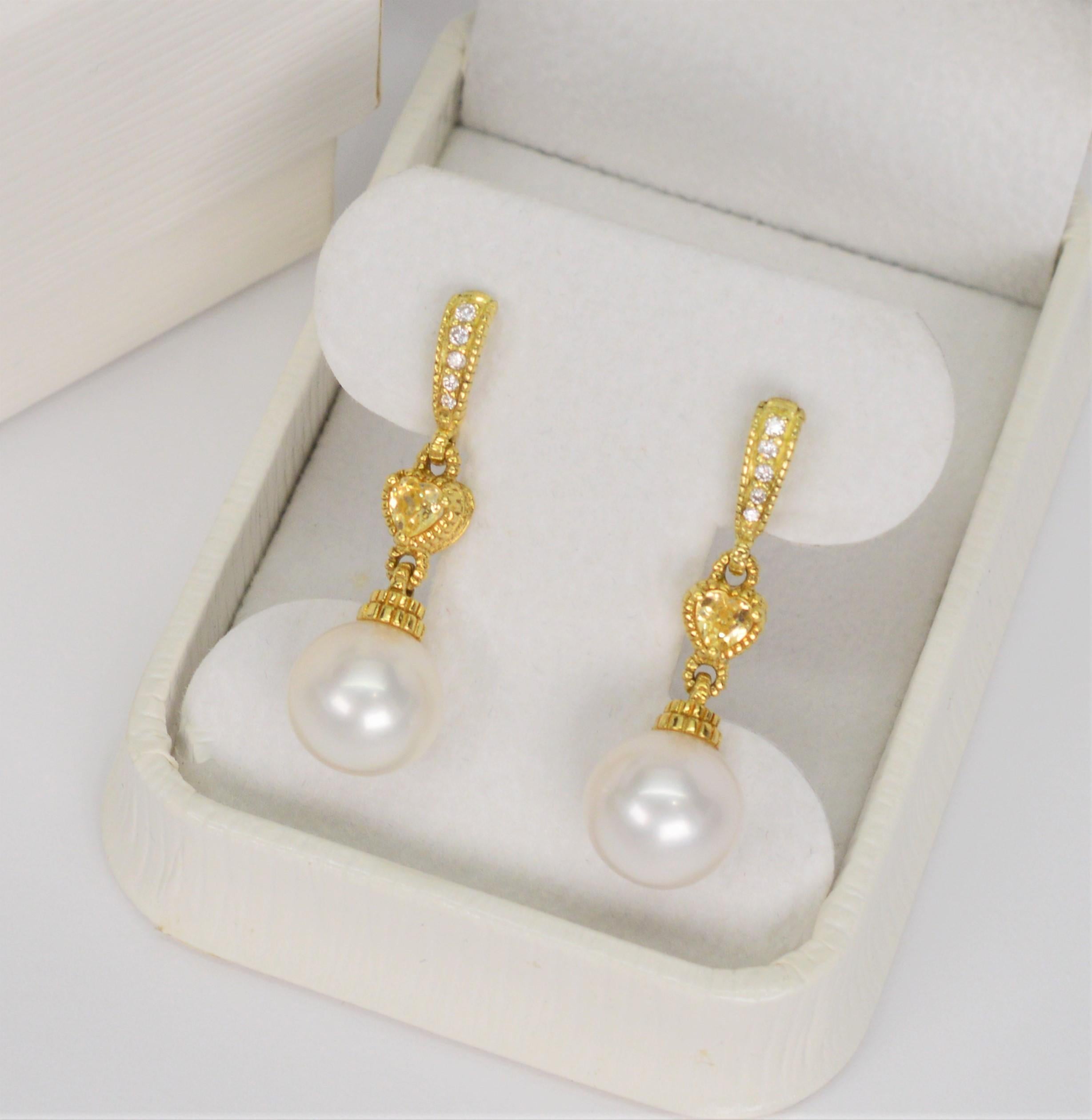 pearl drop earrings with gold accent