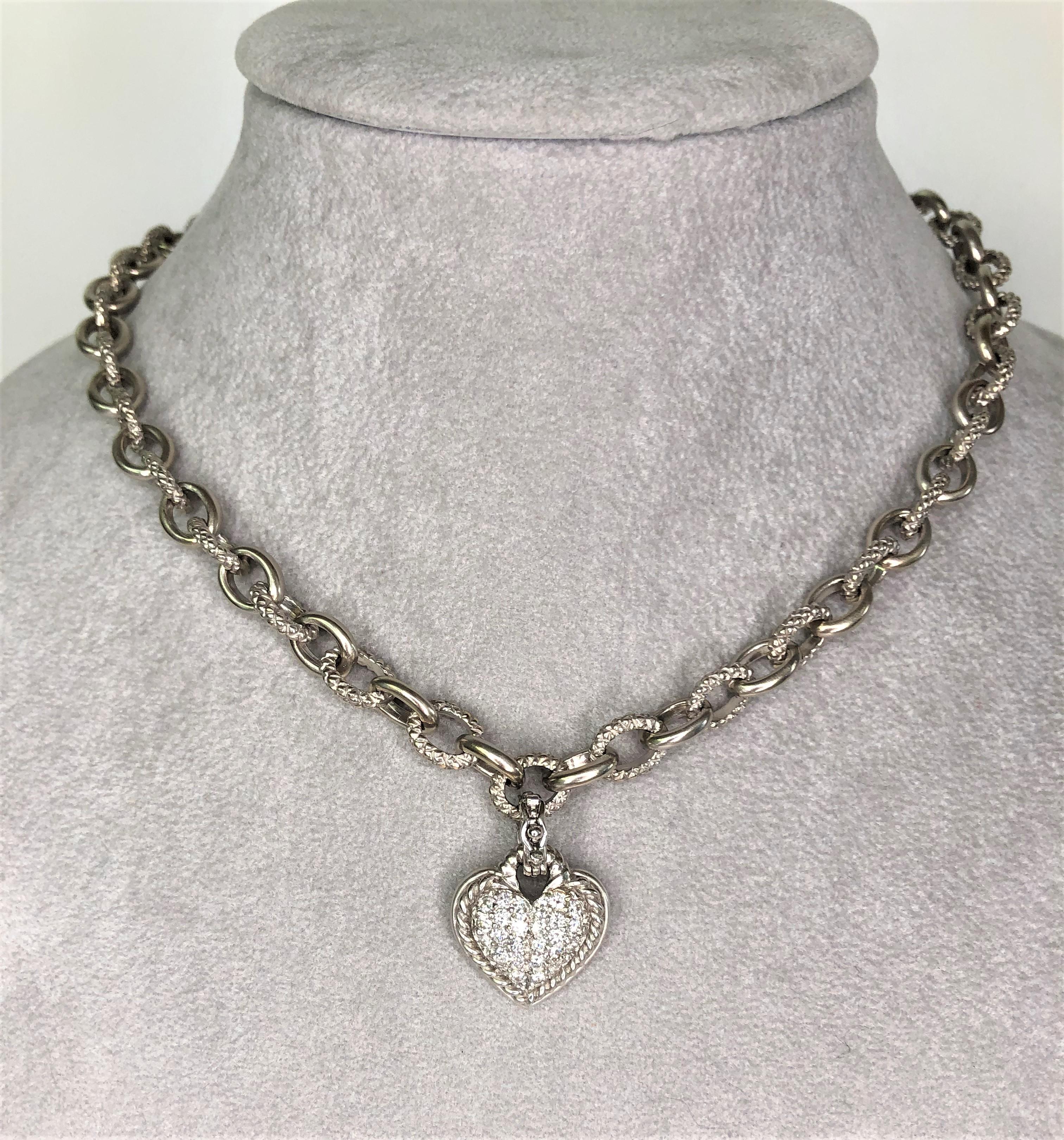 By designer Judith Ripka, this necklace is beautifully crafted and will last the test of time!
A great everyday piece to add to anyone's jewelry collection.
Solid 18 karat white gold.  
8mm cable chain alternates smooth and textured links.
Smaller