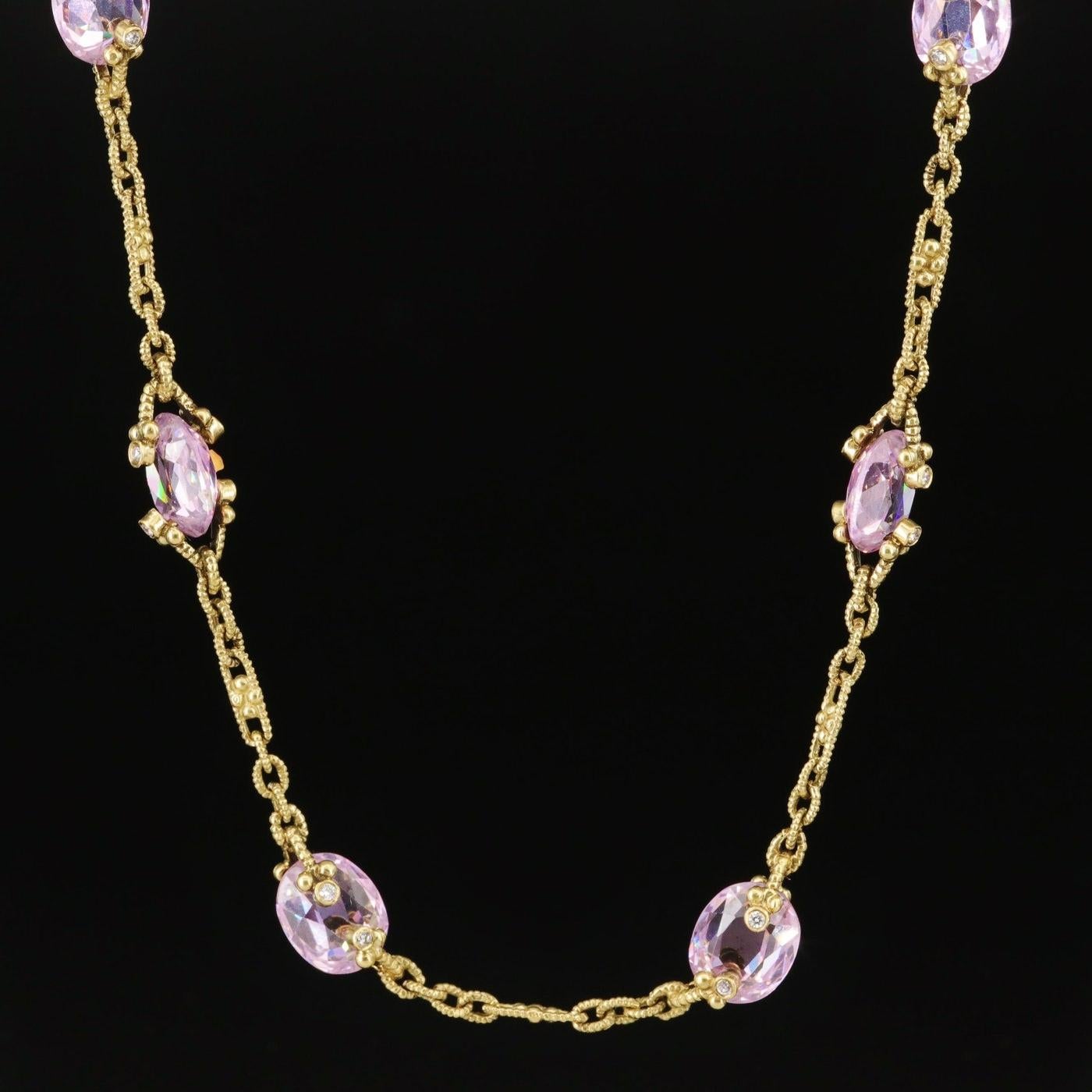 Designer Judith Ripka Necklace (stamped with the designer hallmarks)

NEW with tags, Tag Price $8500

18K solid Yellow gold

Very heavy and well made, 23.8 grams in weight 

27.5 CWT Diamond (0.5 CT) and Pink Sapphire (27 CT)
              - Diamond