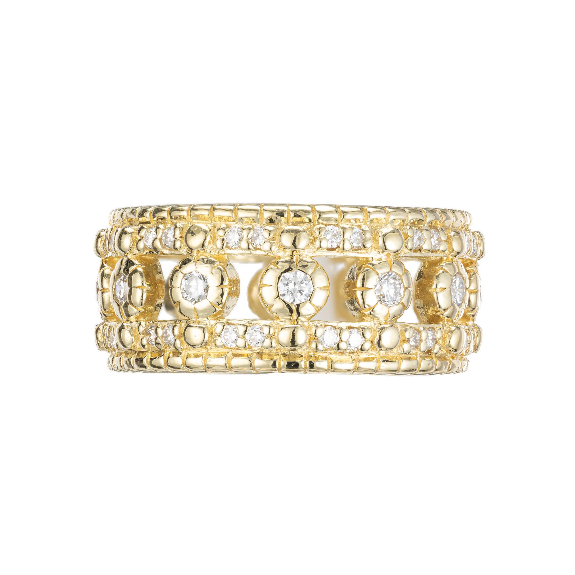 Judith Ripka bold wide diamond Eternity Wedding band ring. As a perfect example of Judith Ripka's craftsmanship, this 18k yellow gold band is enriched with 62 round brilliant cut diamonds totaling approximately .62 carts. Size 4 1/2. possibly