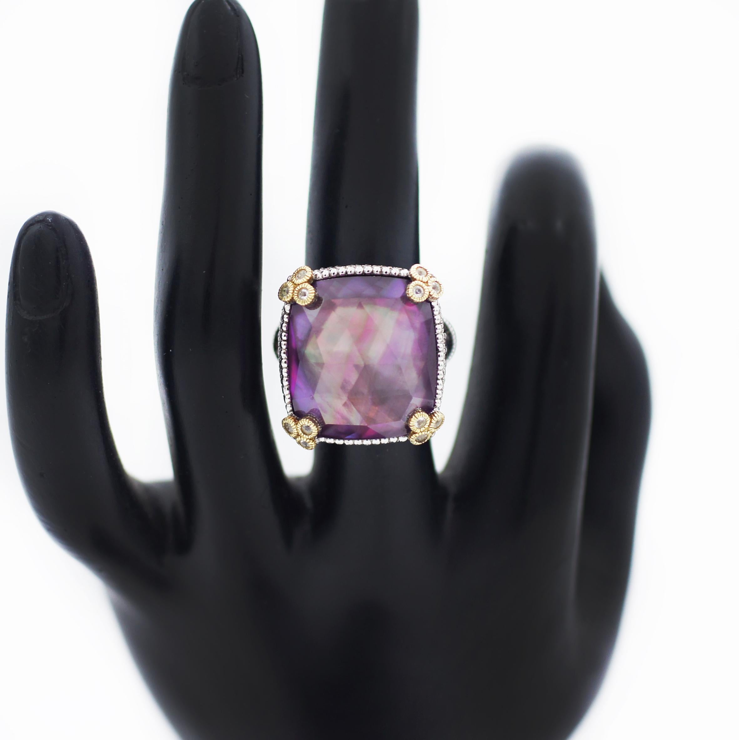 Judith Ripka
925 Sterling Silver
18K Gold accents
Diamond - Round Cut - Approx. HI/SI1SI2 - 0.25ctw
Black Sapphire - Round Cut - Approx. 2ctw
Pink Corundum - Cushion Cut - Approx. 20mm x 17mm
Ring Size 6.5 US
Approx. Weight 17.6 grams
Hallmarked: JR