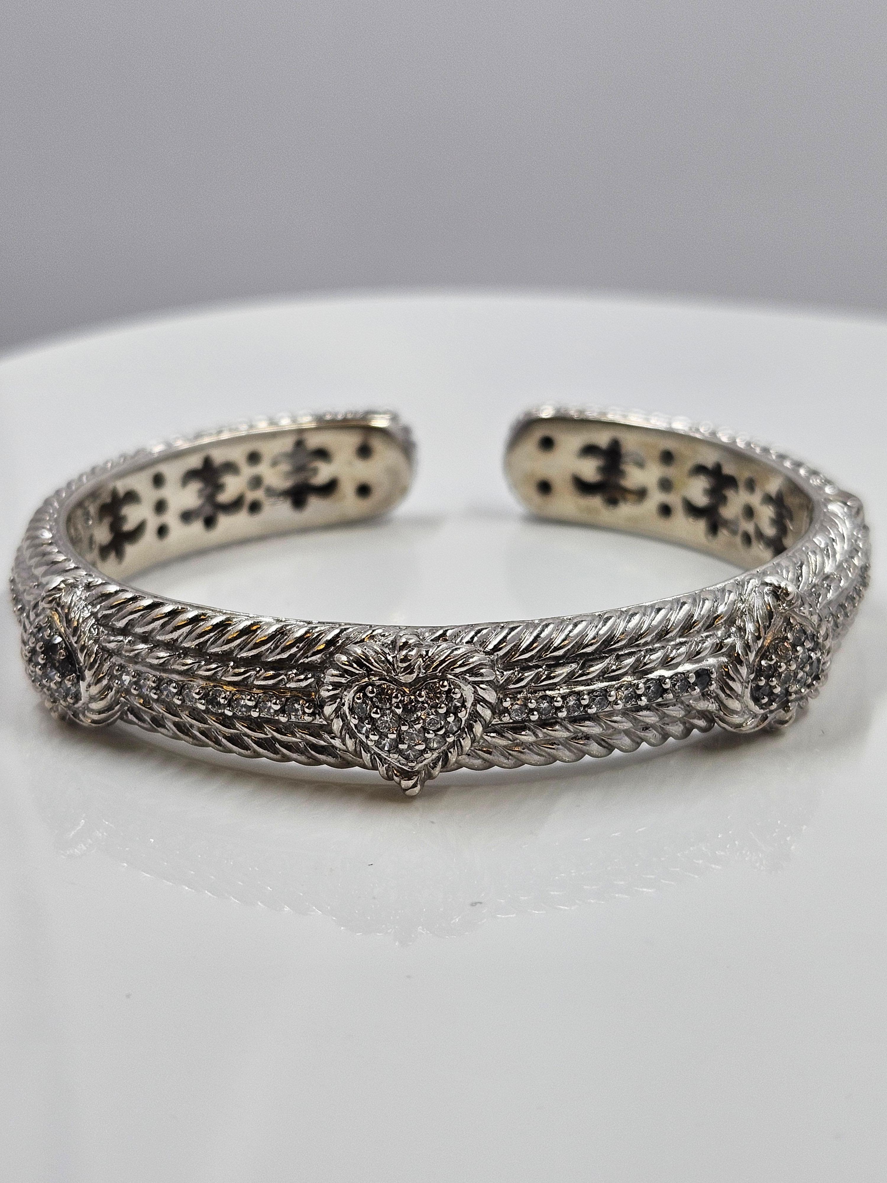 Gorgeous Judith Ripka 925 sterling silver and cz heart hinged cuff bracelet. 62mm diameter and 11mm band thickness.
