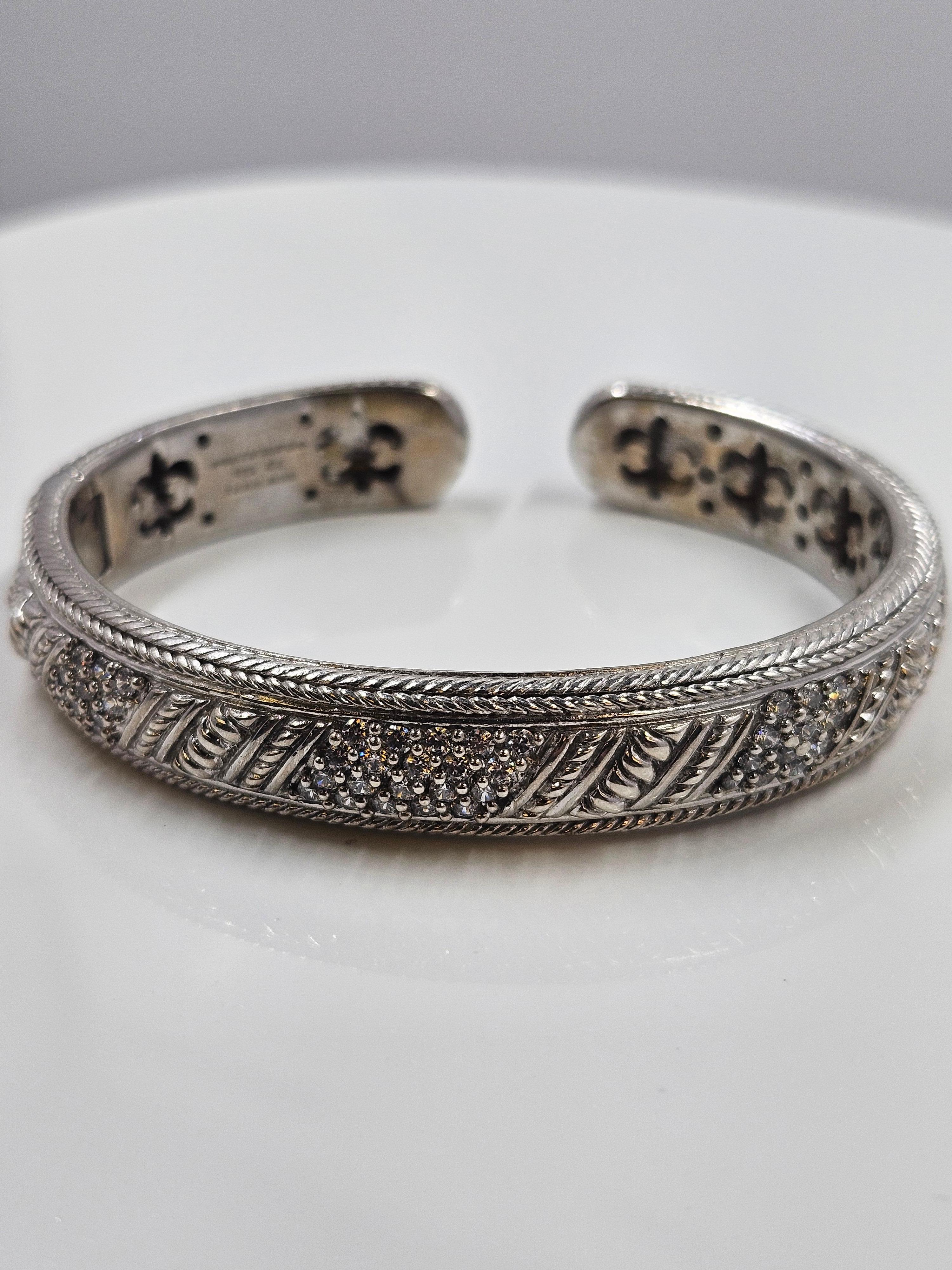 Beautiful Judith Ripka 925 sterling silver and cz hinged cuff bracelet. 63mm diameter.