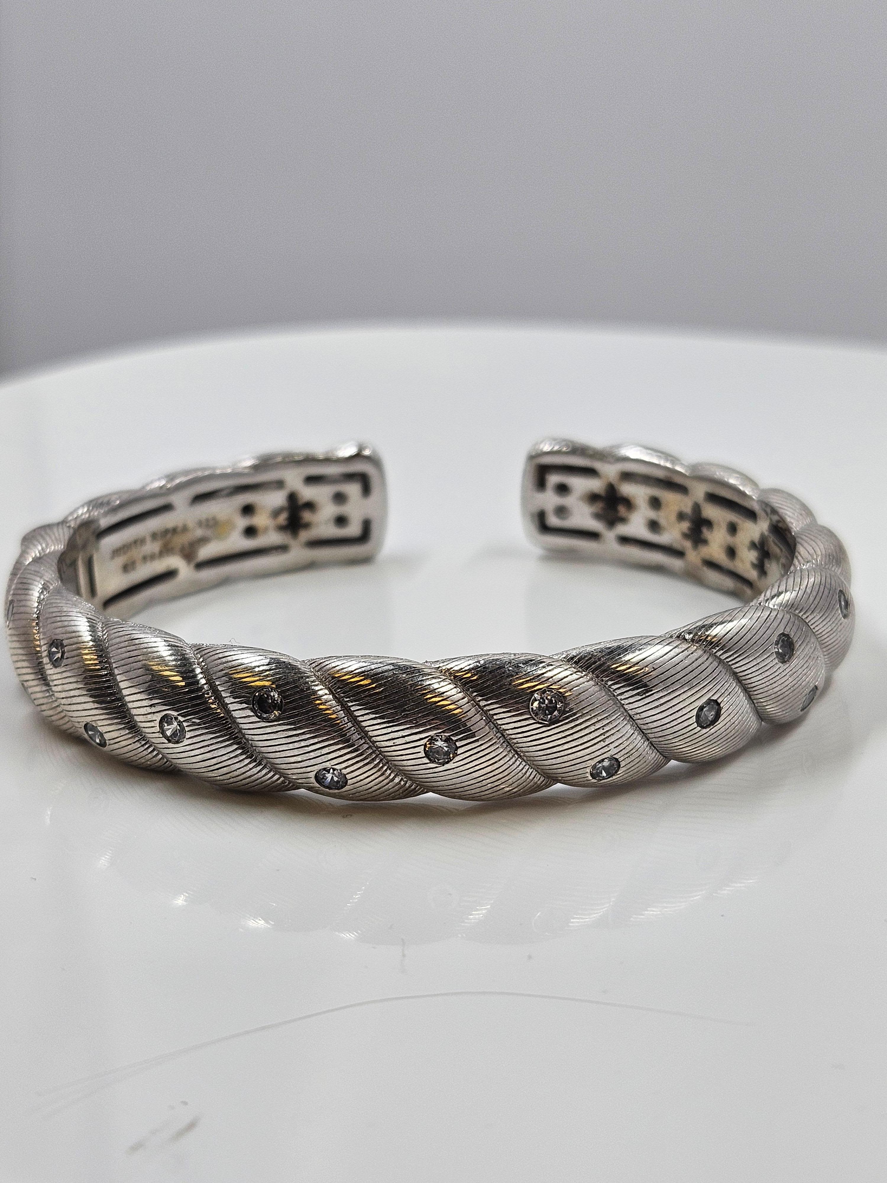 Judith Ripka 925 sterling silver and cz hinged cuff bracelet. 64mm diameter and 12mm band thickness.