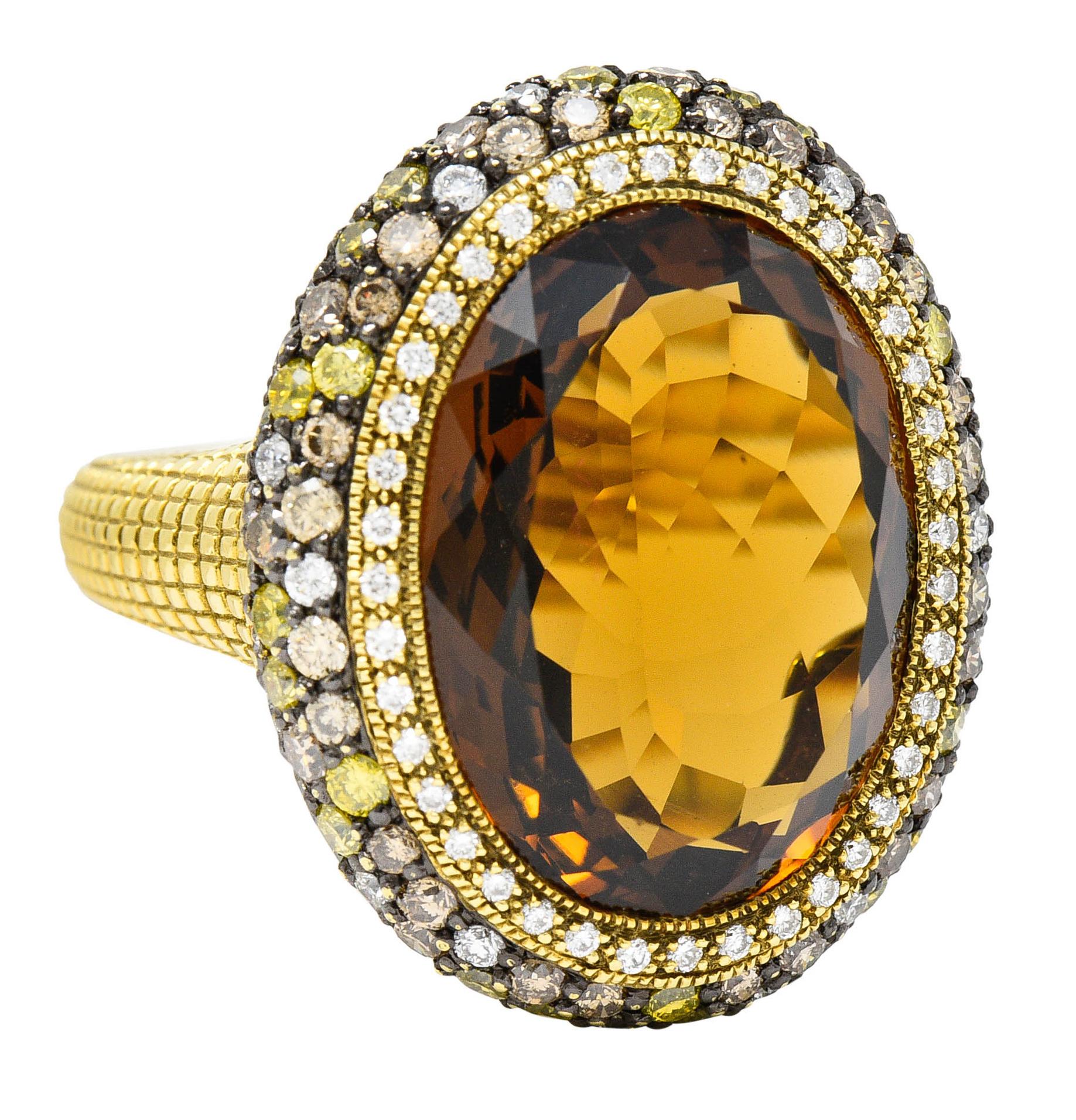 Features a mixed oval cut citrine measuring approximately 19.5 x 14.8 mm

Transparent with saturated and uniform brownish orange color

With a halo of round brilliant cut diamonds weighing in total approximately 0.50 carat

And a pavè set surround
