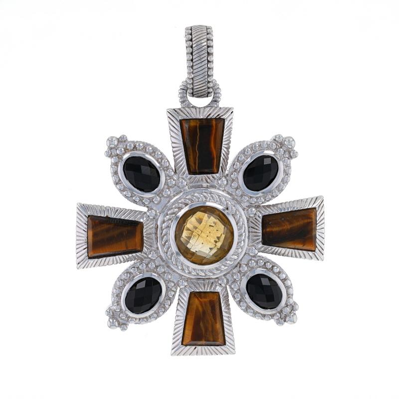 Brand: Judith Ripka

Metal Content: Sterling Silver

Stone Information

Natural Citrine
Treatment: Heating
Color: Yellow

Natural Tiger's Eye
Color: Brown

Natural Onyx
Color: Black

Style: Enhancer
Theme: Cross, Faith

Measurements

Tall (from