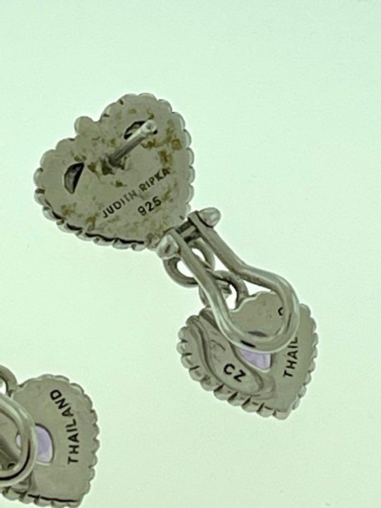 JUDITH RIPKA CZ Sterling Silver Heart Pierced Earrings w Amethyst 9.9 grams
These beautiful 