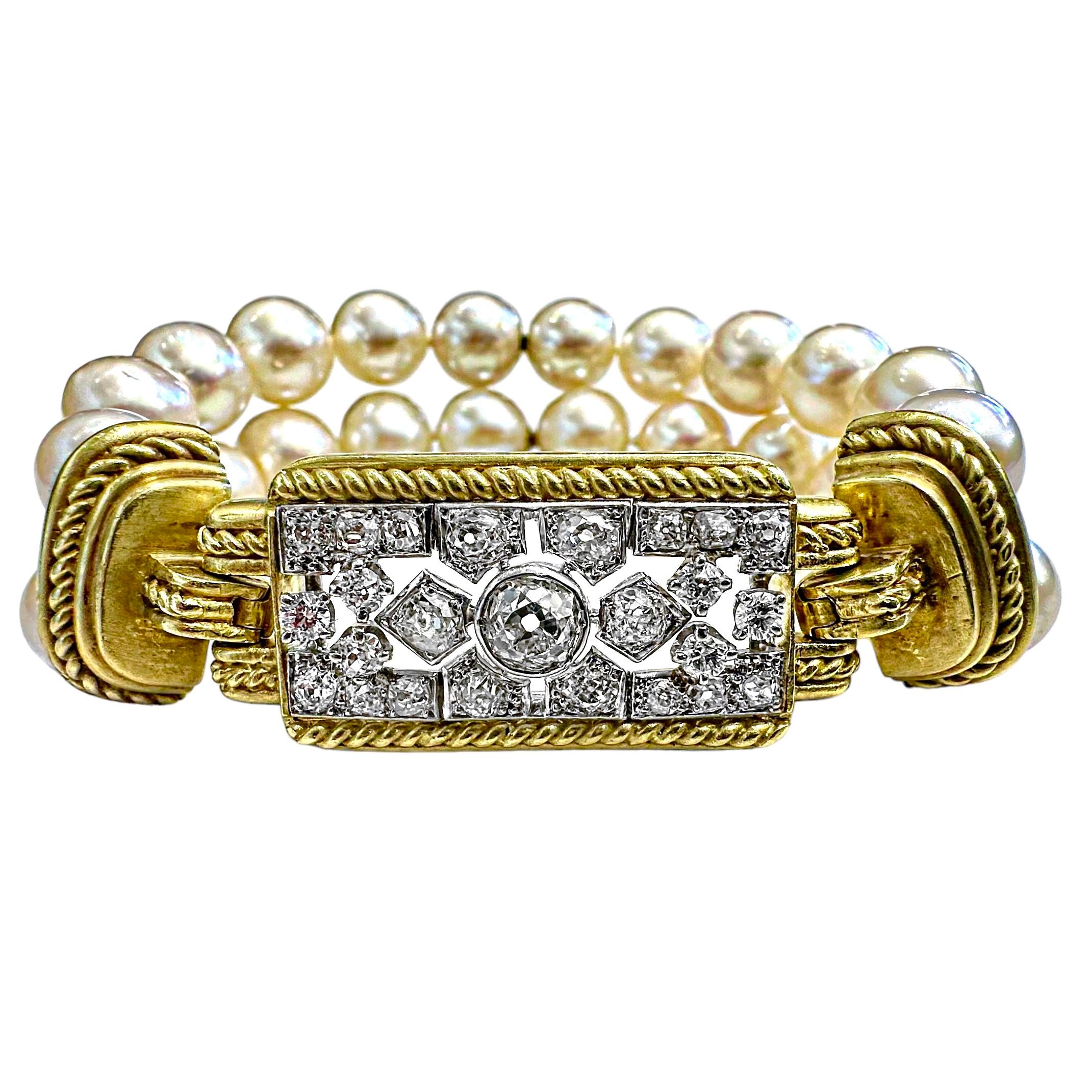 This unique Art Deco style piece is a departure from Judith Ripka's typical pearl and diamond bracelet. The center station is comprised of an original, platinum Art Deco plaque set with assorted old mine cut diamonds, and is bordered by Ripka's