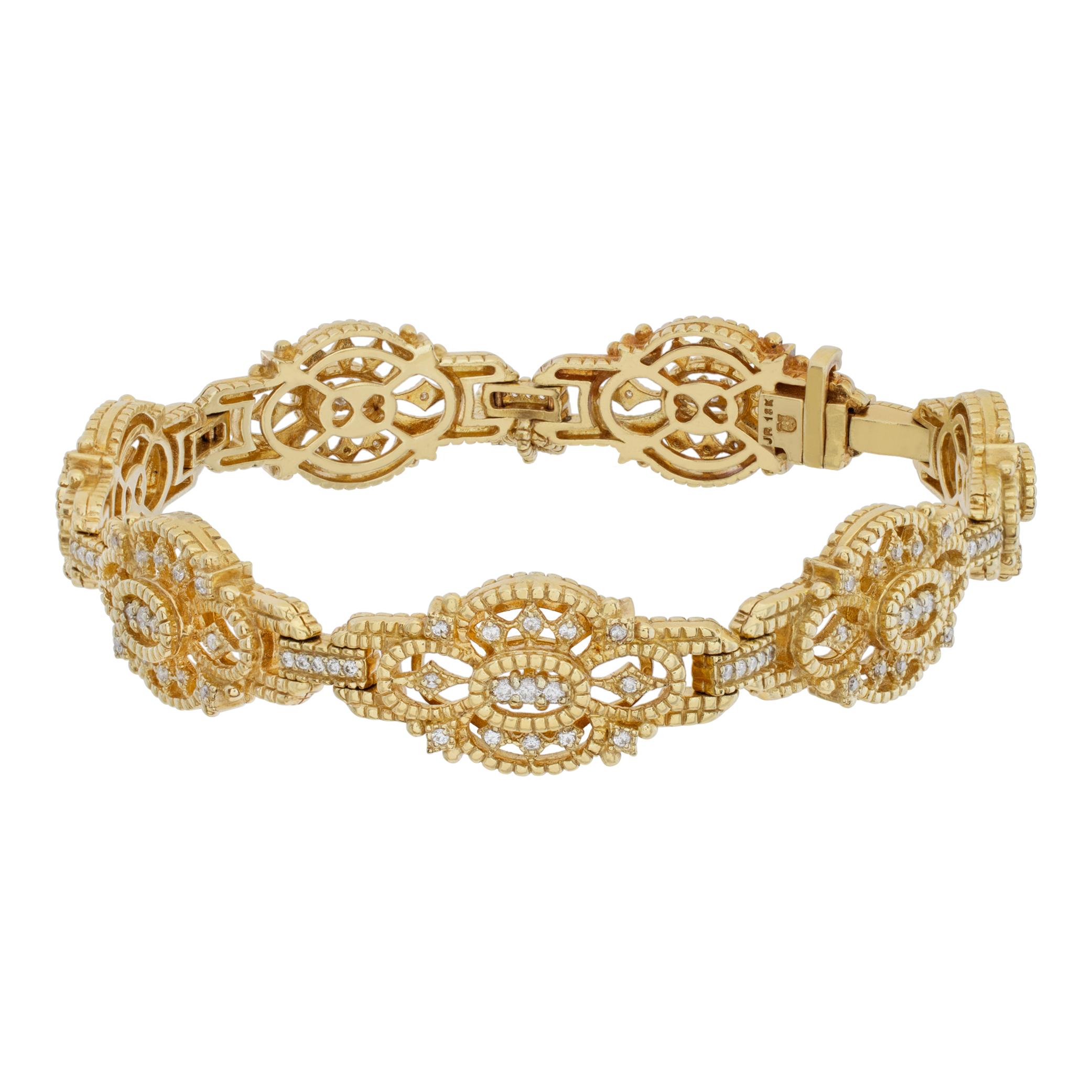 Judith Ripka diamond bracelet in 18k yellow gold with approximately 0.95 carats in diamonds. 7 inch length.