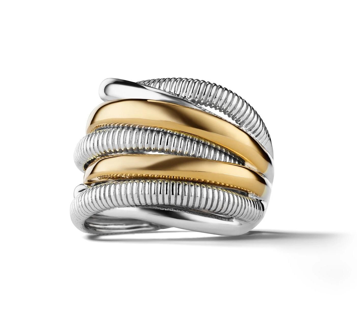 Our coveted Eternity Highway Ring reflects the original design that the entire collection was built upon. The modern, sculptural, intertwining texture and high polish bands represent the eternal love in our lives.

Sterling Silver with Solid18K