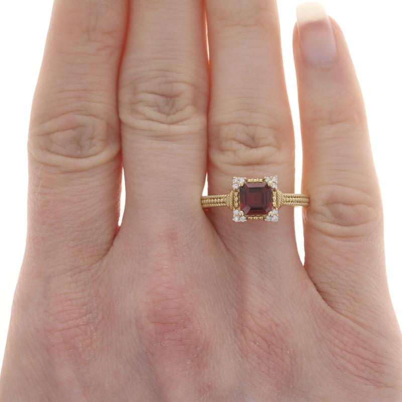 Retail Price: $1300

Size: 8
Sizing Fee: Up 2 sizes for $35 or Down 3 sizes for $35

Brand: Judith Ripka

Metal Content: 14k Yellow Gold

Stone Information
Natural Garnet
Carat(s): 1.20ct
Cut: Asscher
Color: Red

Natural Diamonds
Carat(s):