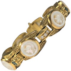 Judith Ripka Gold Bracelet with Diamonds Emeralds and Carved Mother of Pearl