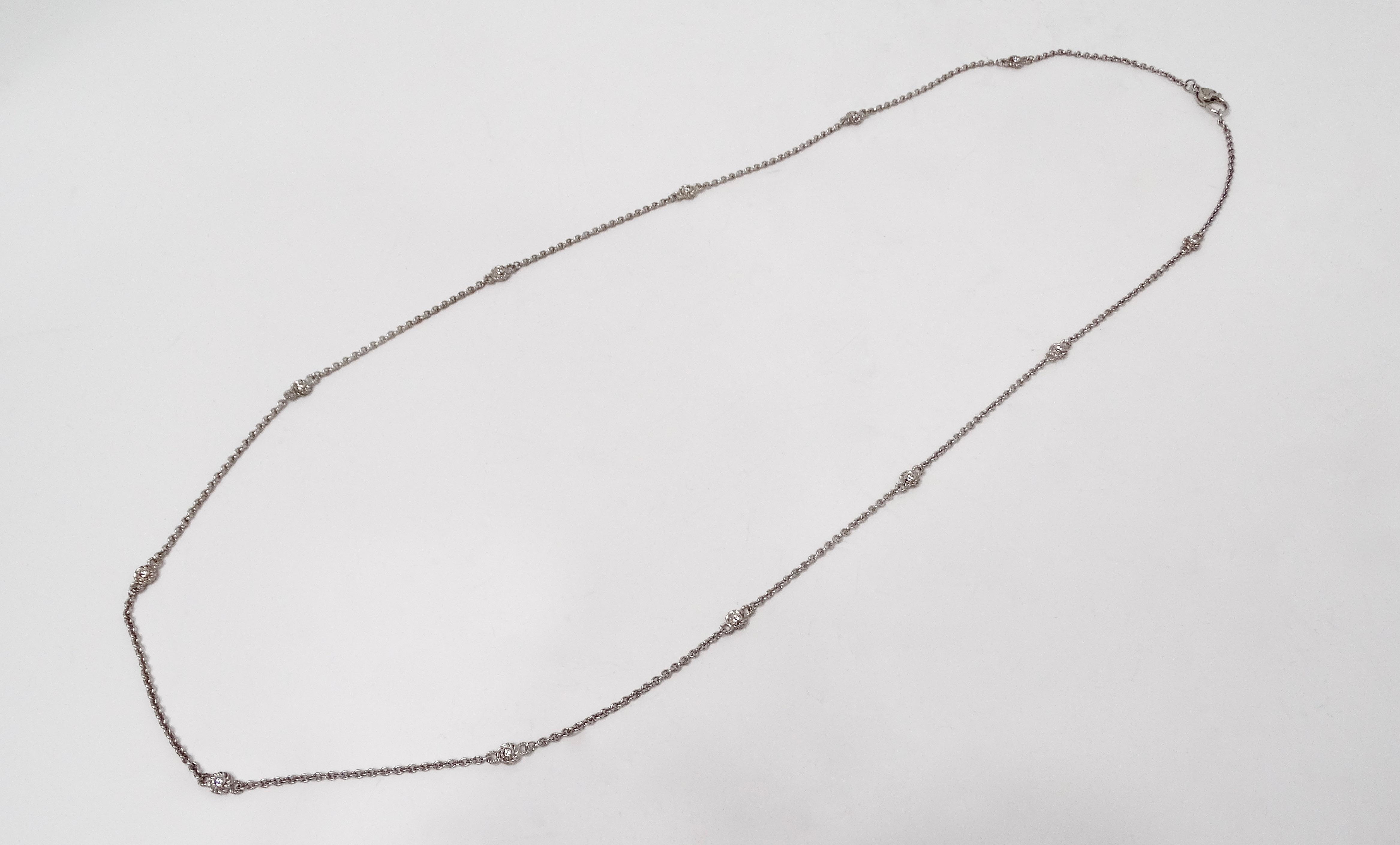 The Judith Ripka Long Sterling Silver Chain Necklace with Cubic Zirconia Accents is a timeless piece that effortlessly elevates any ensemble. Crafted from high-quality sterling silver, this necklace features exquisite cubic zirconia accents that