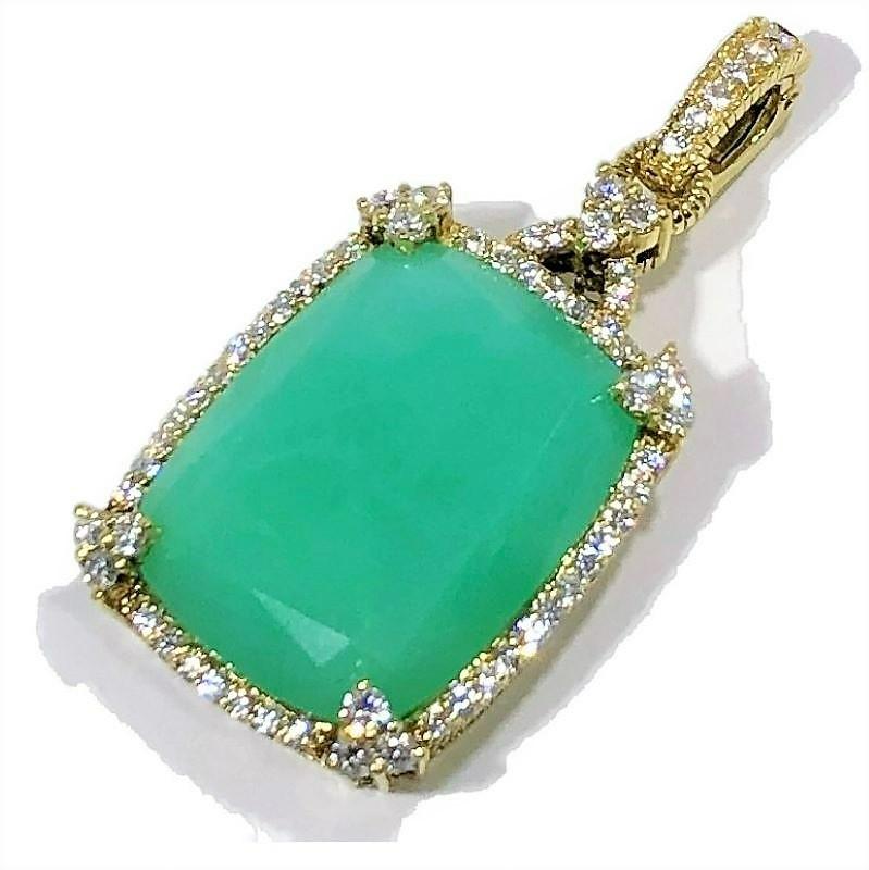 This lovely and expertly crafted Judith Ripka pendant has at it's center, one large cushion shaped, faceted pastel green onyx stone surrounded by a continuous line of brilliant cut diamonds and a diamond encrusted bale. Total approximate diamond