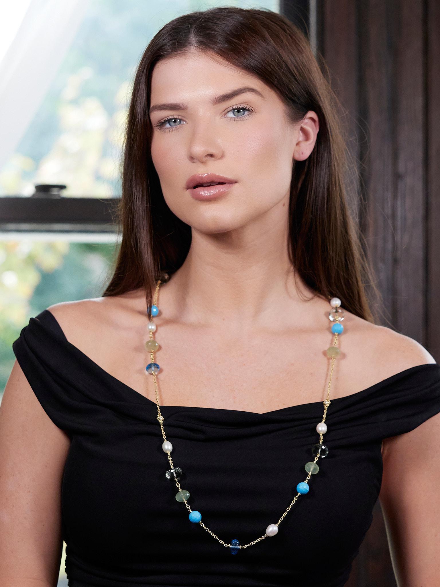 Designed as a fancy twisted rope motif cable link chain with gemstone bead stations 
With faceted round turquoise beads measuring 12.0 mm round - opaque robins egg blue
Additional disk-shaped faceted beads are topaz, quartz, and aventurine