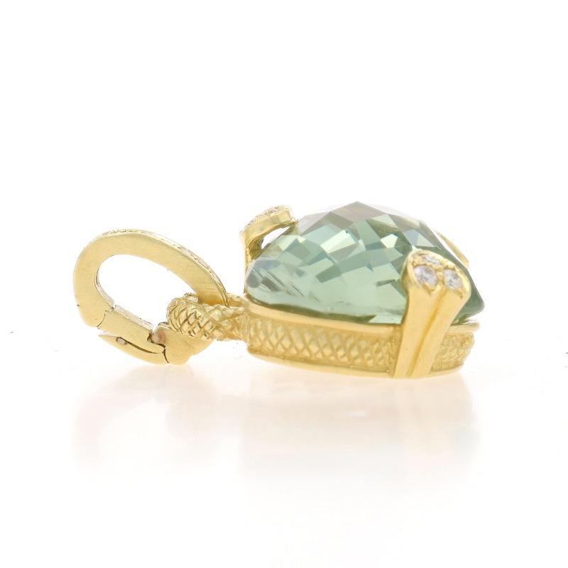 Brand: Judith Ripka

Metal Content: 18k Yellow Gold

Stone Information
Natural Prasiolite
Cut: Heart Cabochon Checkerboard
Color: Green

Natural Diamonds
Carat(s): .37ctw
Cut: Round Brilliant

Total Carats: .37ctw

Style: Pendant Enhancer
Theme: