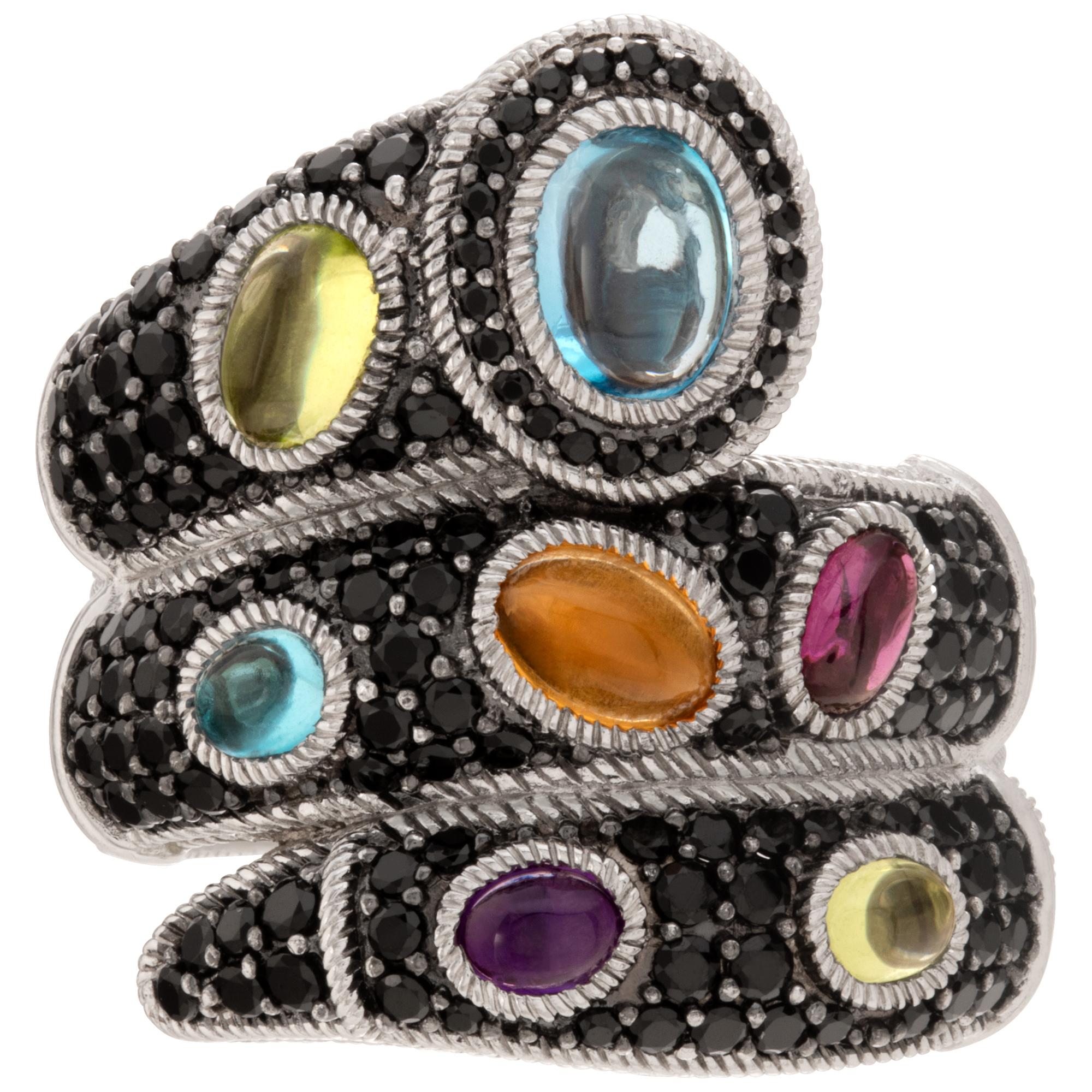 Judith Ripka ring with black spinel and multi-colored gemstones in sterling silver. Size 11, head 26mm thick, shank 9mm thick.This Judith Ripka ring is currently size 11 and some items can be sized up or down, please ask! It weighs 11.6 pennyweights