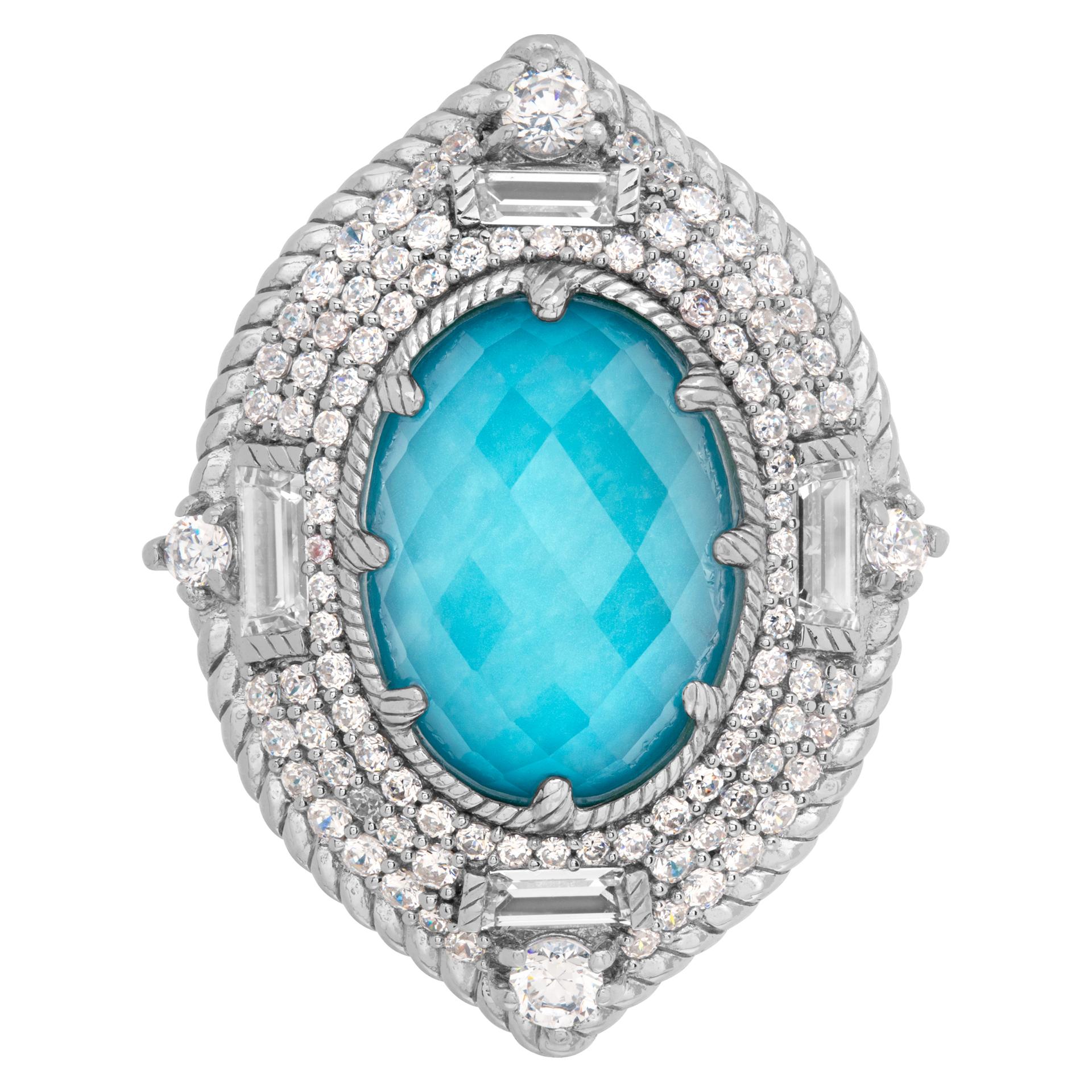 Judith Ripka ring with faceted blue topaz and cz white stones in sterling silver. Size 7, measures 32mm x 25mm at head, 3mm shank.This Judith Ripka ring is currently size 7 and some items can be sized up or down, please ask! It weighs 10.9