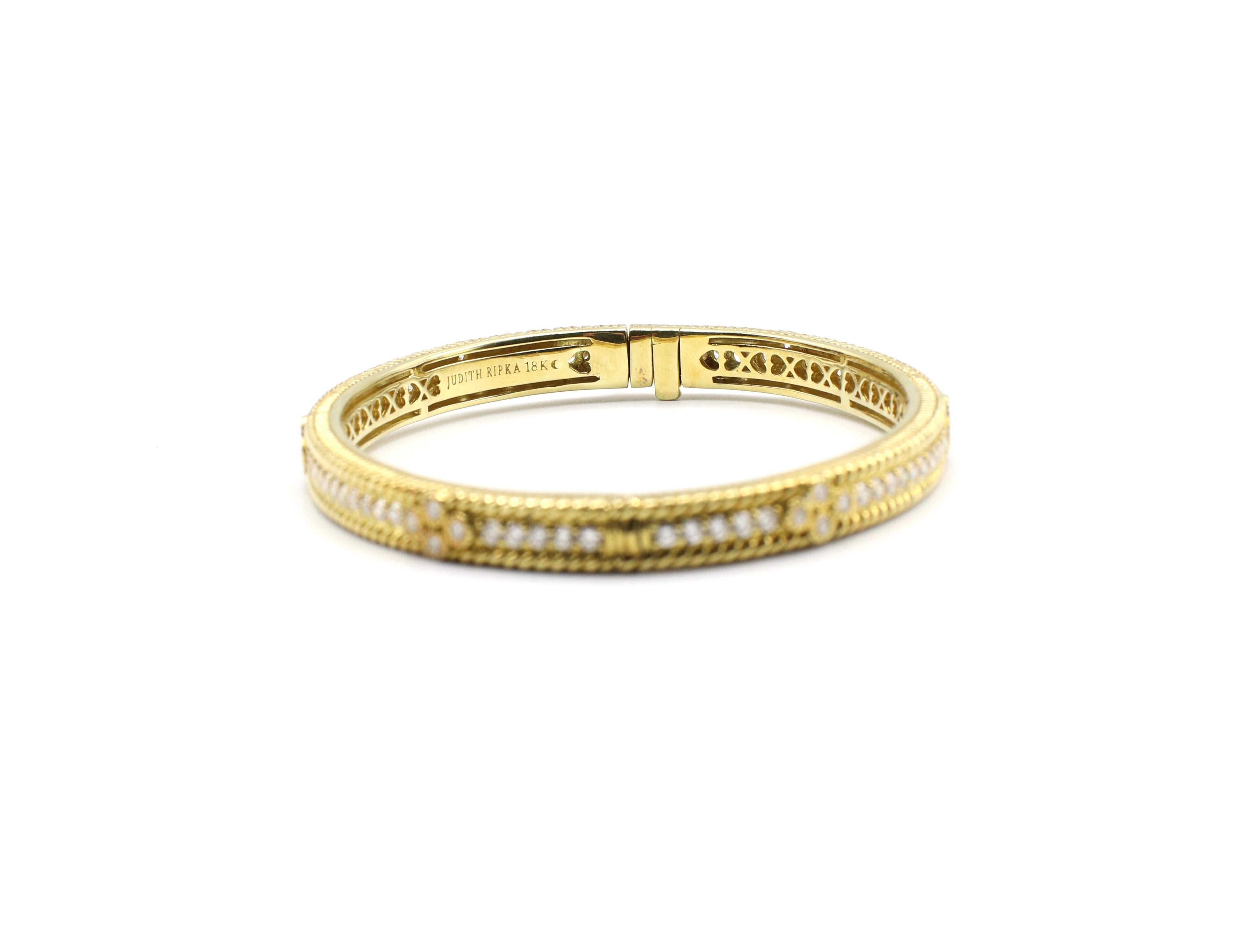 For Sale is a Judith Ripka Bangle Bracelet from the Romance collection in 18K Yellow Gold. Set the this piece are approx. 2.50 CTW of Round Brilliant Cut Diamonds. The bracelet is hinged for ease of wear. We estimate it to fit approx. a 6.5-7 inch