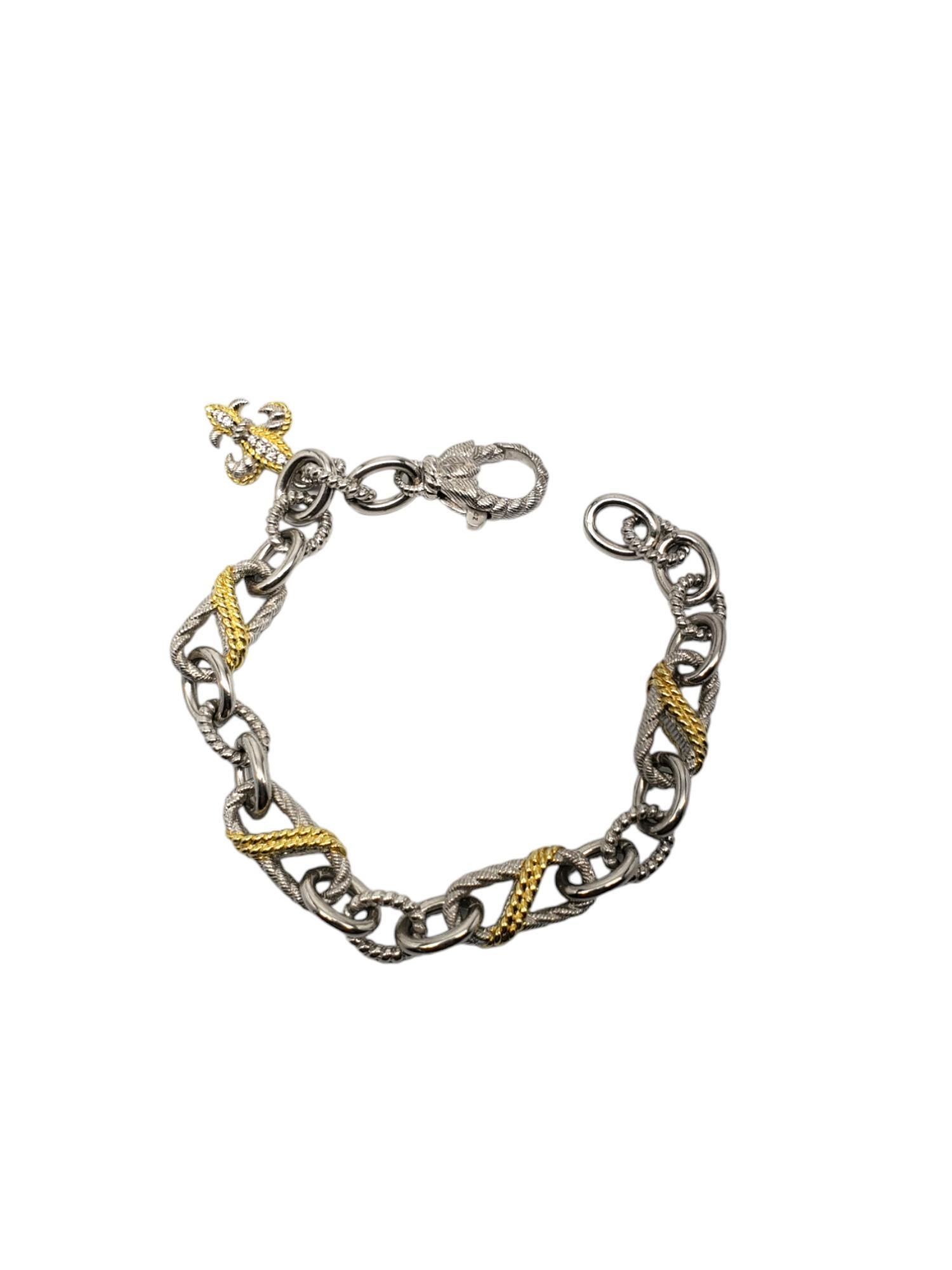Judith Ripka Sterling Silver Cubic Zirconia Fleur De Lis Two Tone Bracelet -

This elegant Fleur De Lis two tone bracelet is set in classic sterling silver by Judith Ripka.

Size: fits up to 7