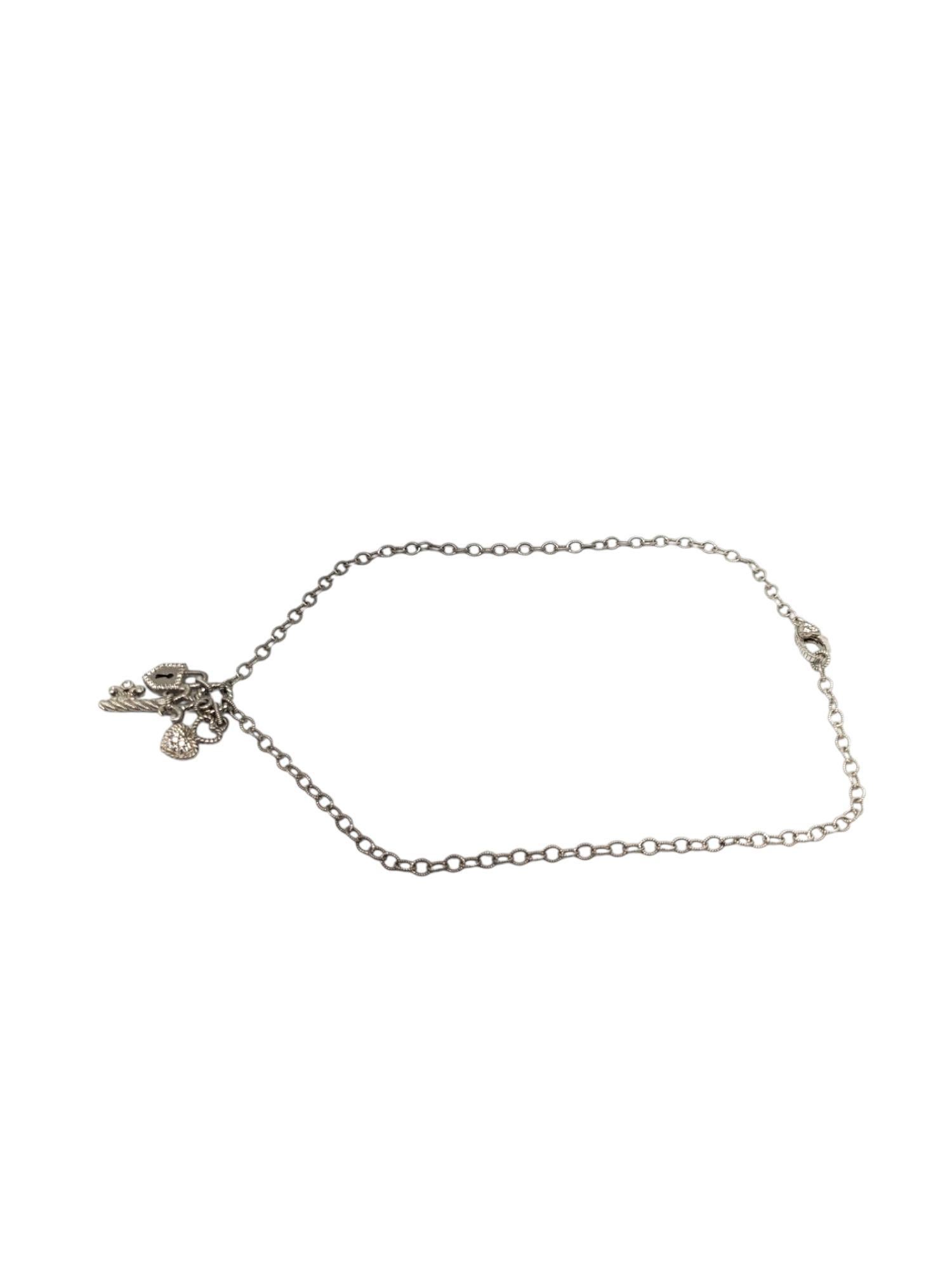 Judith Ripka Sterling Silver CZ Key Heart Lock Pendant Necklace -

This vintage pendant necklace features a key padlock & heart accented with CZ stones set in sterling silver by Judith Ripka.

Chain: 18 in.

Stamped: JUDITH RIPKA 925 CZ