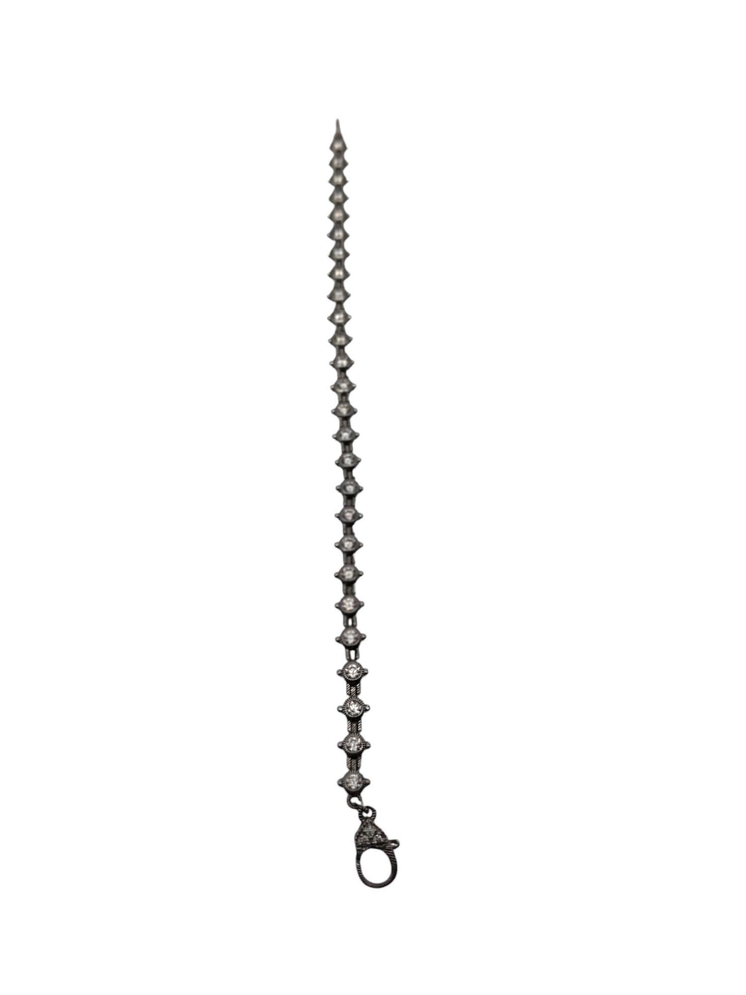 Judith Ripka Sterling Silver & CZ Tennis Bracelet -

This classic tennis bracelet by Judith Ripka features 26 round CZ set in sterling silver with a toggle clasp.

Size: 7.5 in.

Approx. 6.3 mm at widest

Stamped: JUDITH RIPKA 925 CZ