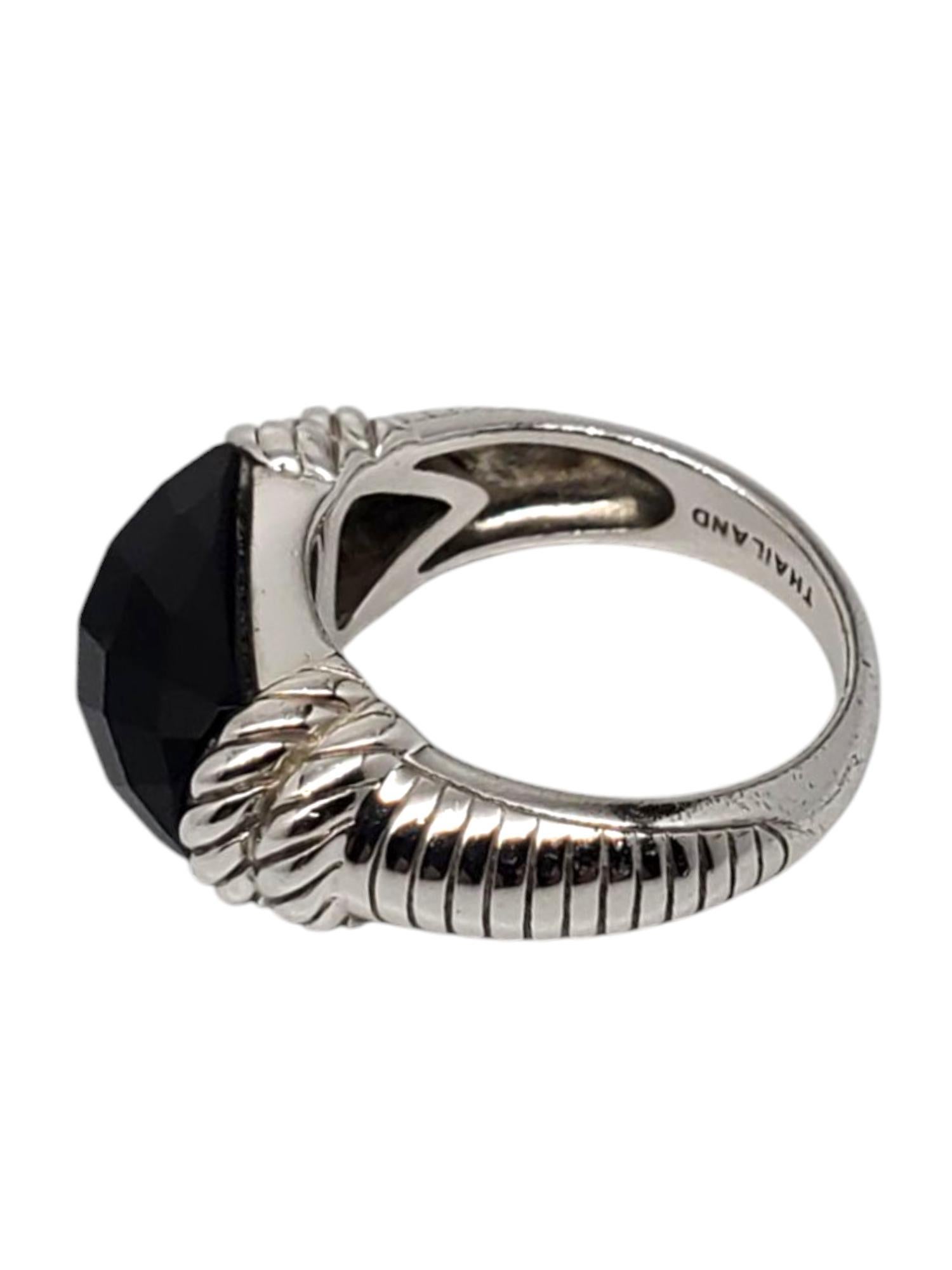 Judith Ripka Sterling Silver Faceted Onyx Ring -

This stunning ring features a large faceted black onyx gemstone (8. mm x 14 mm) set in a ribbed sterling silver band by Judith Ripka.

Shank: 3 mm

Size: 7

Stamped: JUDITH RIPKA 925