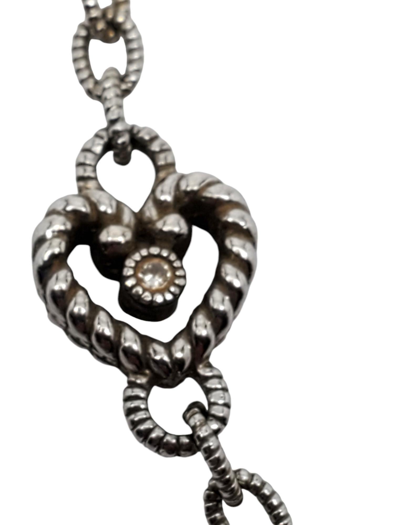 Judith Ripka Sterling Silver Heart CZ Chain Necklace

This vintage sterling silver link chain necklace features hearts with a cubic zirconia center & a lobster claw clasp by Judith Ripka.

Size: 20 in.

Stamped: JUDITH RIPKA THAILAND 925

Weigh: