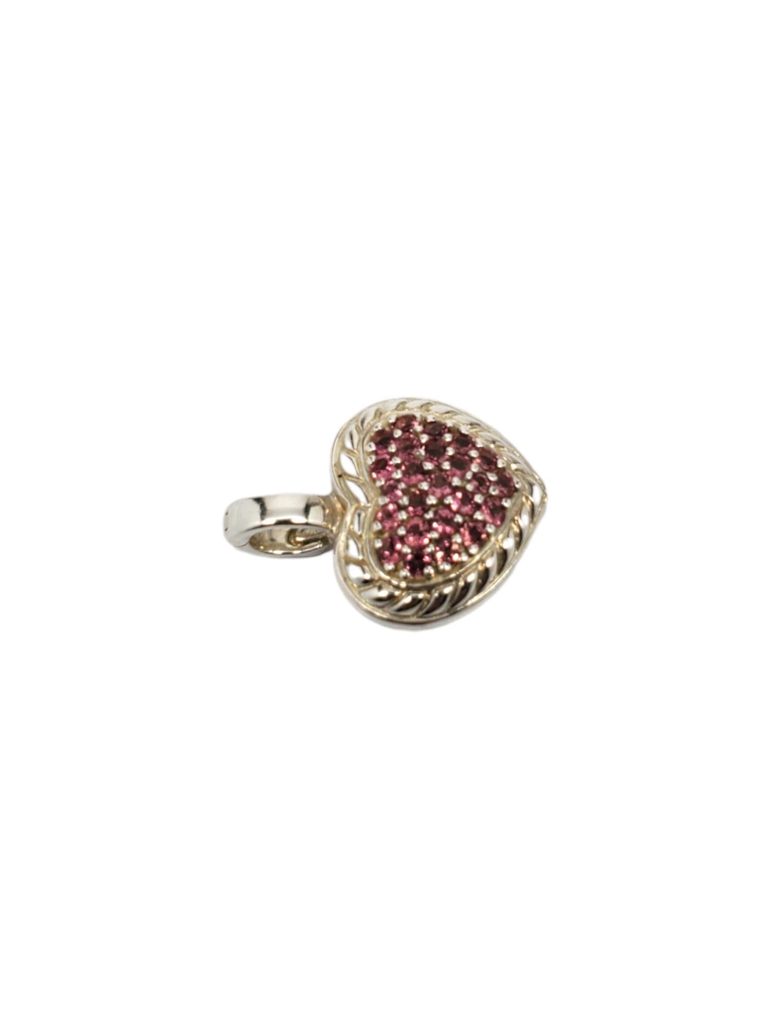 Judith Ripka Sterling Silver Pink CZ Heart Pendant-

This beautiful Judith Ripka heart pendant with enhancer features a pave cubic zirconia pink heart with rope design set in sterling silver.

Size: 30.17 mm. with bail.

Stamped: JUDITH RIPKA 925 CZ