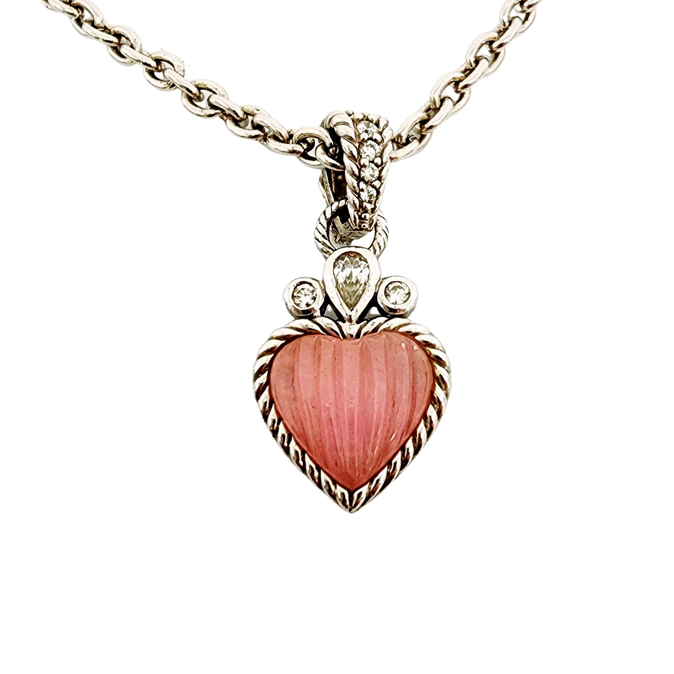 Sterling silver pink jadelite and CZ  heart enhancer with pink jadelite bead necklace by Judith Ripka

Designer piece featuring pink jadelite bead station chain with CZ accent textured lobster claw closure. Includes removable ribbed pink jadelite
