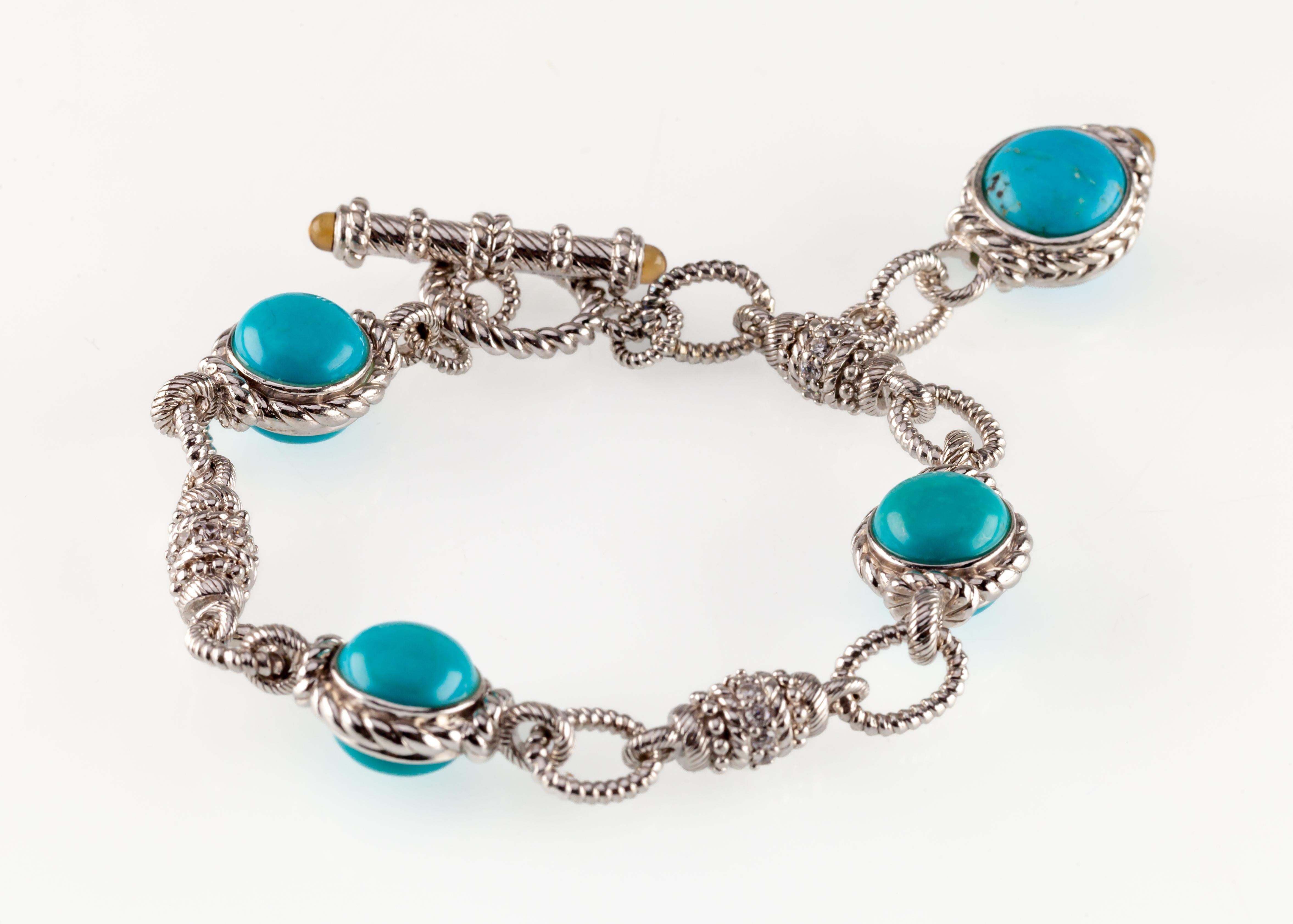 Gorgeous Bracelet by Judith Ripka
Sleeping Beauty Line
Features Round Turquouse with Diamonique Accents
Total Length = 7