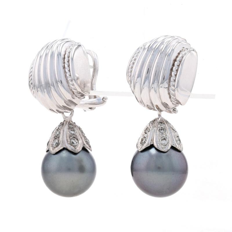Brand: Judith Ripka

Metal Content: 18k White Gold

Stone Information
Natural Tahitian Pearls

Natural Diamonds
Total Carats: .50ctw
Cut: Round Brilliant
Color: F - G
Clarity: VS1 - VS2

Style:  Studs with Removable Dangle Enhancers
Fastening Type: