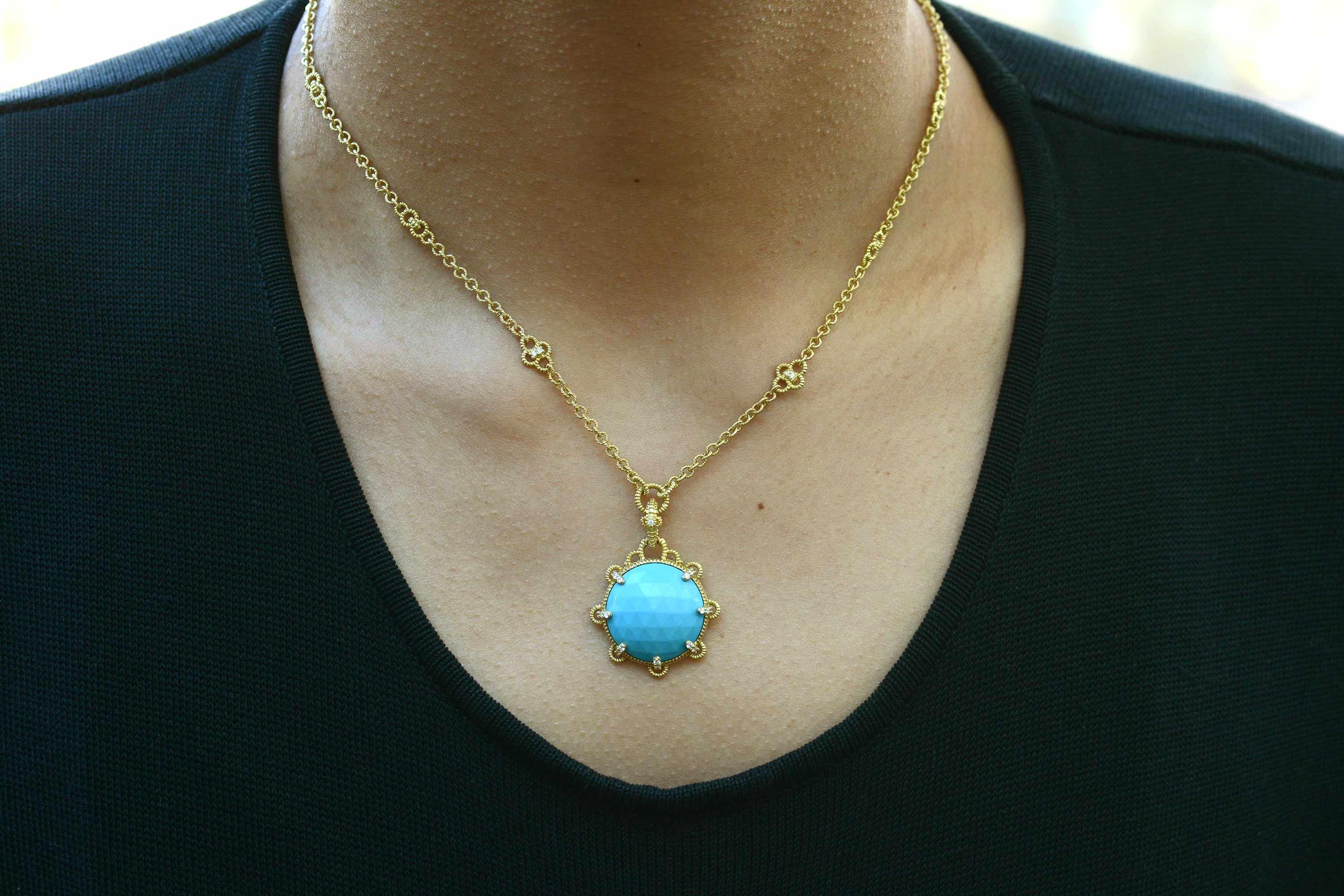 An eminently wearable Judith Ripka Turquoise Necklace fashioned of richly hued solid 18k gold. The Etruscan revival design centers on an interestingly faceted vivid, robin's egg blue turquoise held within 7 diamond encrusted claw prongs, suspended