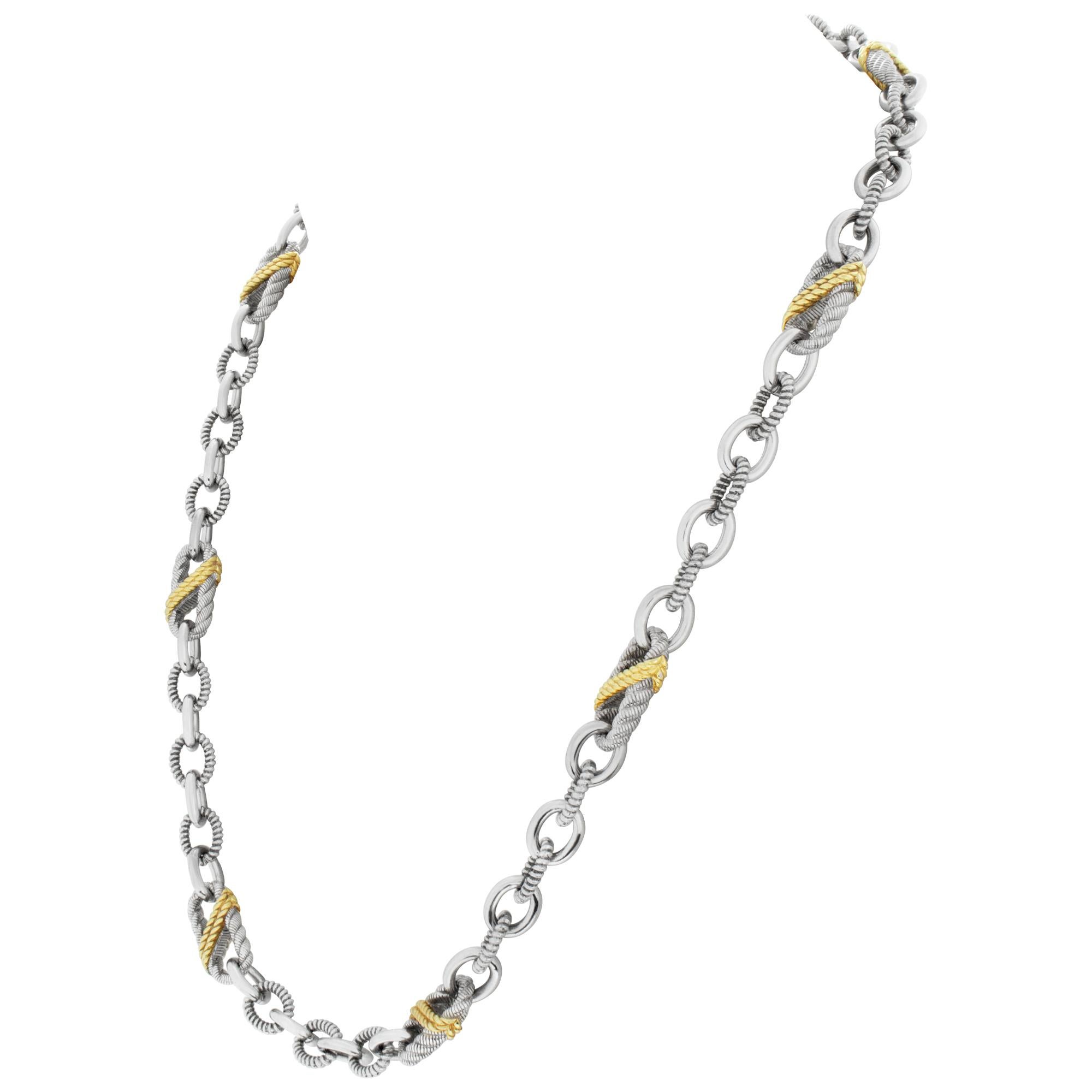 Judith Ripka twisted oval link two-tone chain in sterling silver with accent CZ stones on the spear pendant. Length 20 inches, width 8mm.
