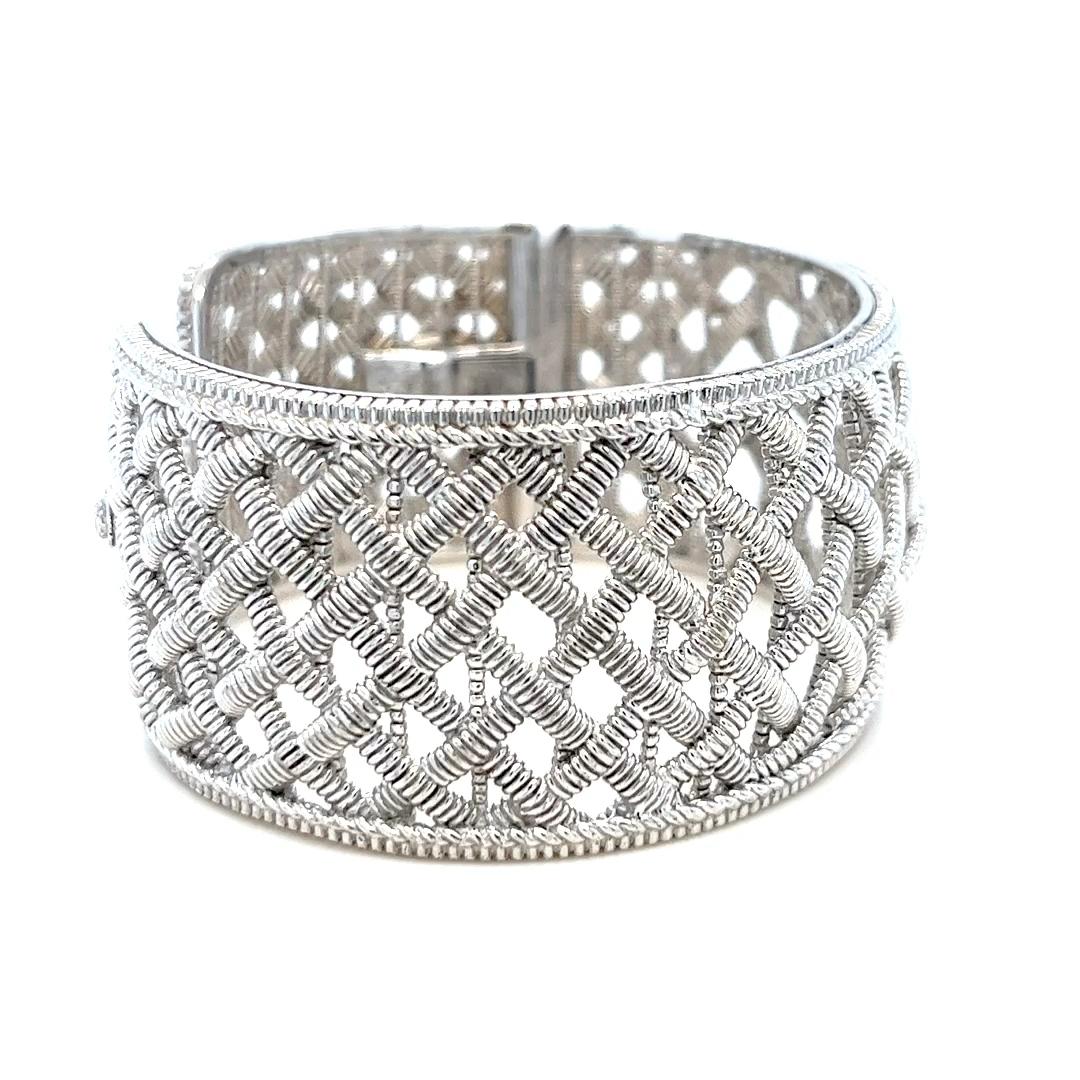 Judith Ripka 30mm wide sterling silver cuff bracelet featuring woven design and hinged closure. $900 MSRP. Finished weight is 70.0 grams.