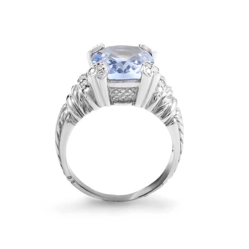 Offering more than just a backdrop to the wonderful blue quartz on the top, the 18K white gold body of this beautiful ring by Judith Ripka, set with diamonds weighing 0.25ct in total, boasts impressive decoration throughout its surface.
