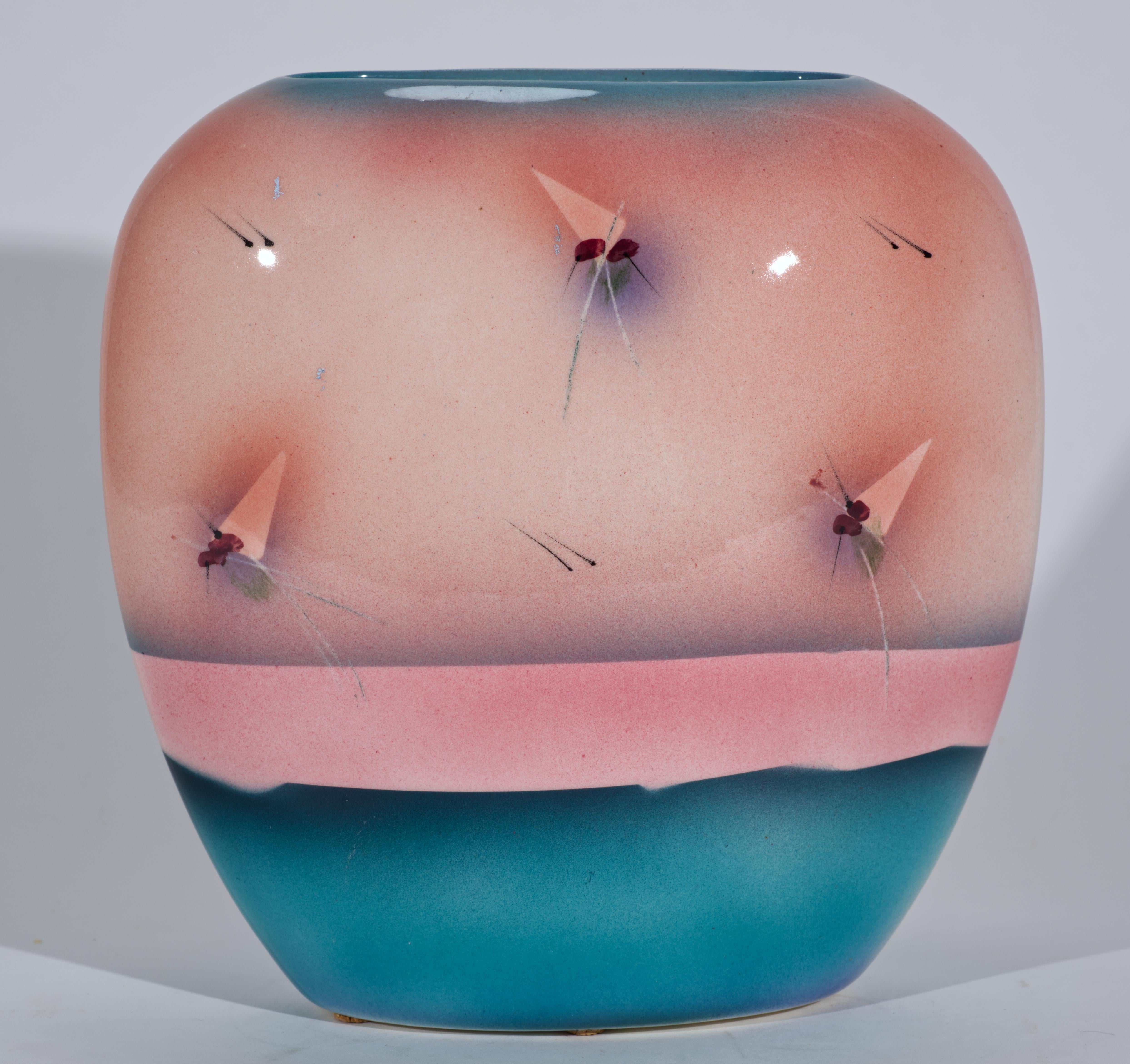 Playful vintage vase features hand painted abstract graphic designs in Postmodern style on ombre mauve pink background with turquoise rim and accent band on the bottom of the vase.

The vase is hand signed by the artist on the bottom.

Judith