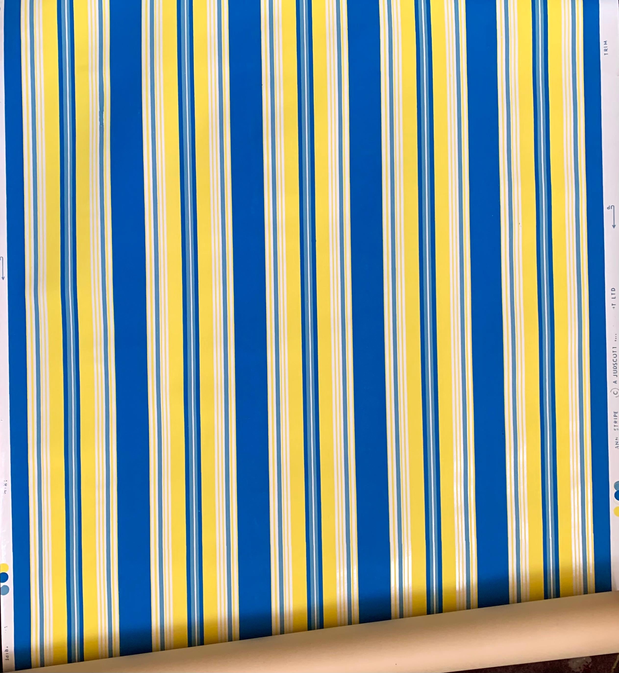 JudScott New York hand-printed ultramarine blue, yellow striped wallpaper, 1970s. Judscott was a small high-end paper and textile company based in New York in the 1970s-80s, producing hand-printed custom work. We have one complete roll and a few