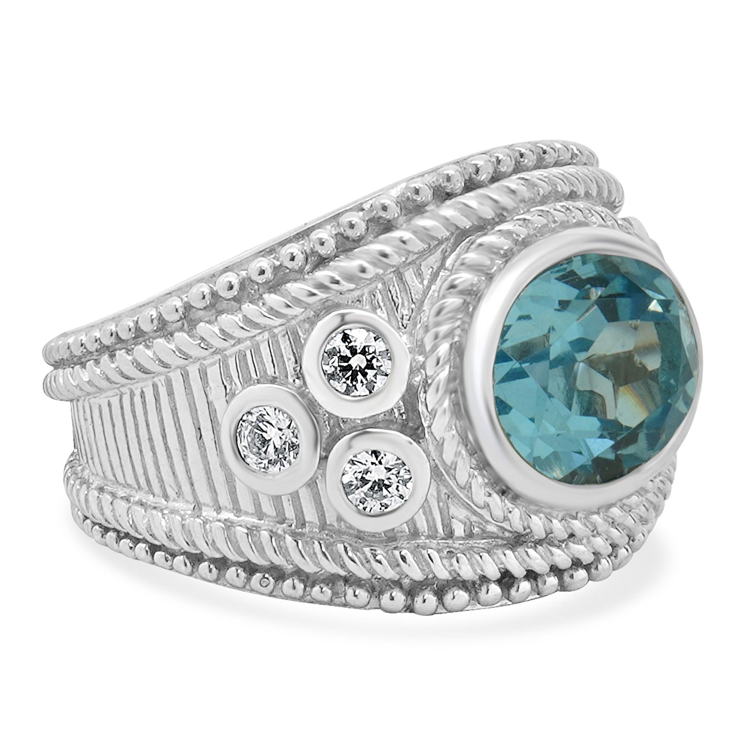 Taglio rotondo Anello Judtih Ripka in argento sterling con topazio blu e CZ in vendita